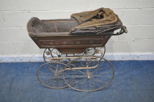 A VICTORIAN PERAMBULATOR, with painted wooden body, leatherette upholstery, folding canopy, raised