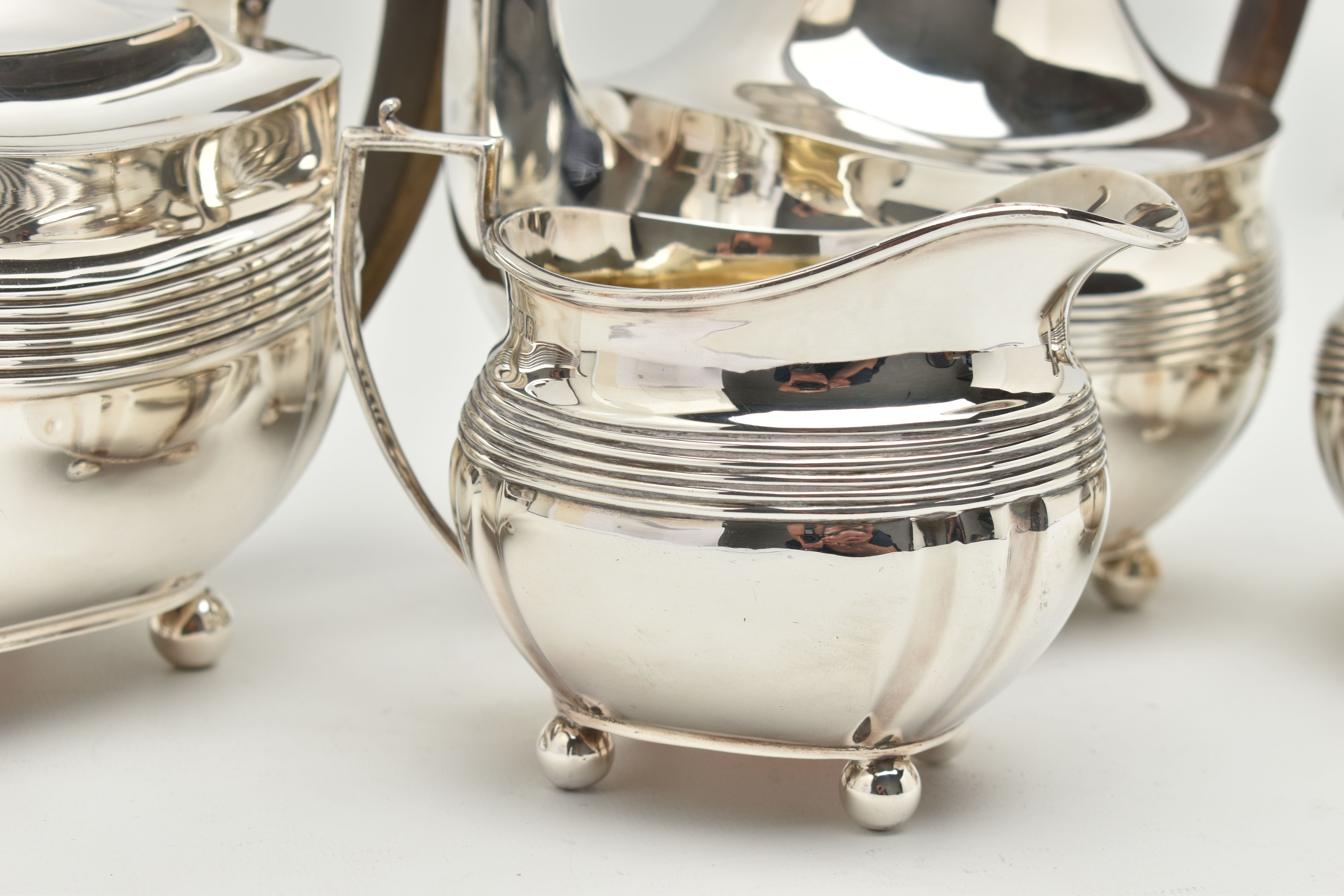 A GEORGE V SILVER FOUR PIECE TEA SERVICE OF SHAPED RECTANGULAR FORM, reeded horizonal band detail - Image 3 of 8