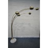 A GUZZINI STYLE GILT METAL ARC LAMP, with five lights, on a marble base (condition report:
