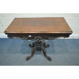 A VICTORIAN ROSEWOOD CARD TABLE, the twist and fold top enclosing a circular green baize playing