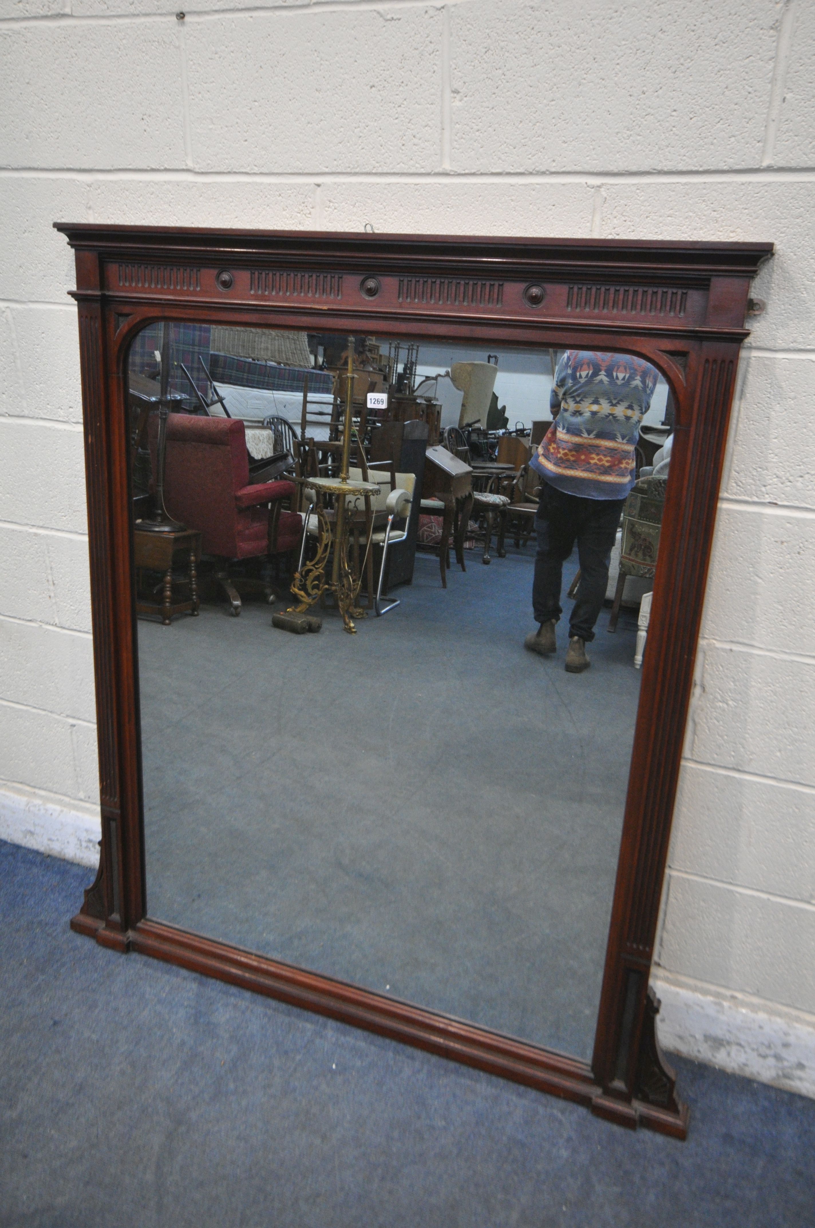 AN EDWARDIAN WALNUT OVERMANTEL MIRROR, 132cm x 145cm (condition report: alteration to the top,