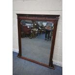 AN EDWARDIAN WALNUT OVERMANTEL MIRROR, 132cm x 145cm (condition report: alteration to the top,
