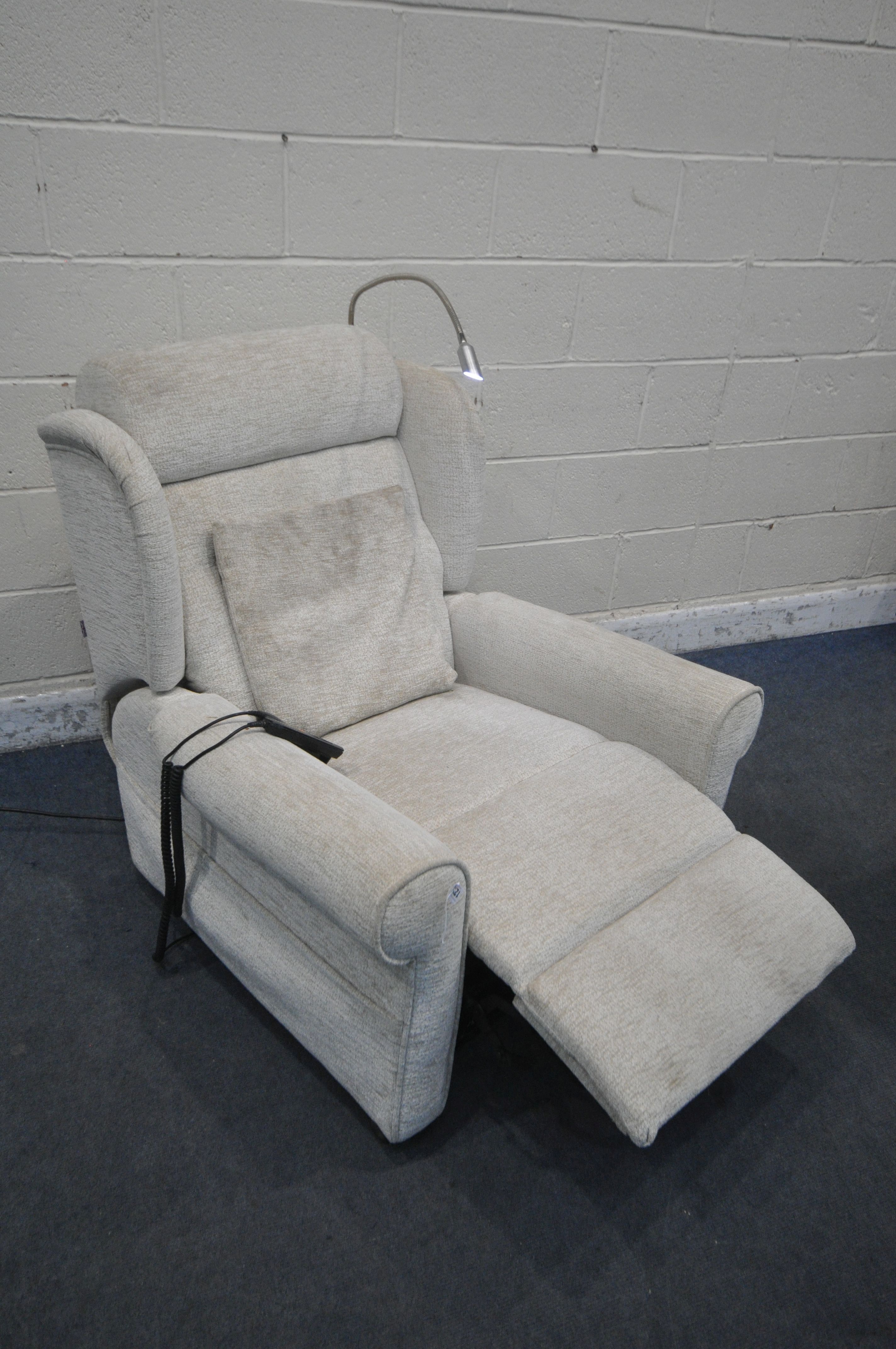 A BEIGE UPHOLSTERED ELECTRIC RISE AND RECLINE ARMCHAIR, with massaging settings (PAT pass and - Image 4 of 4