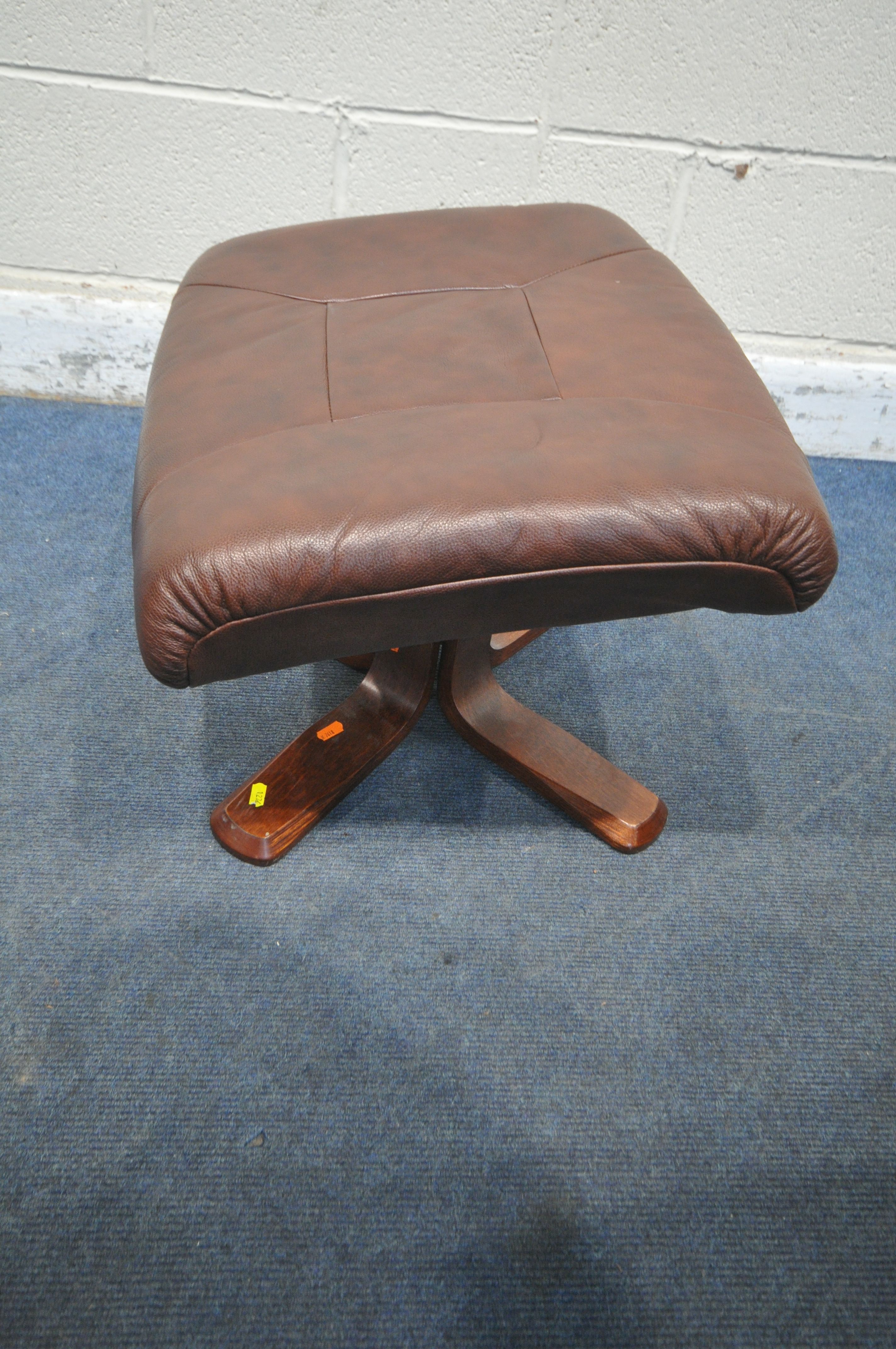 A PAIR OF DARK BLUE UPHOLSTERED ARMCHAIRS, along with a brown footstool (condition report: in need - Image 3 of 3