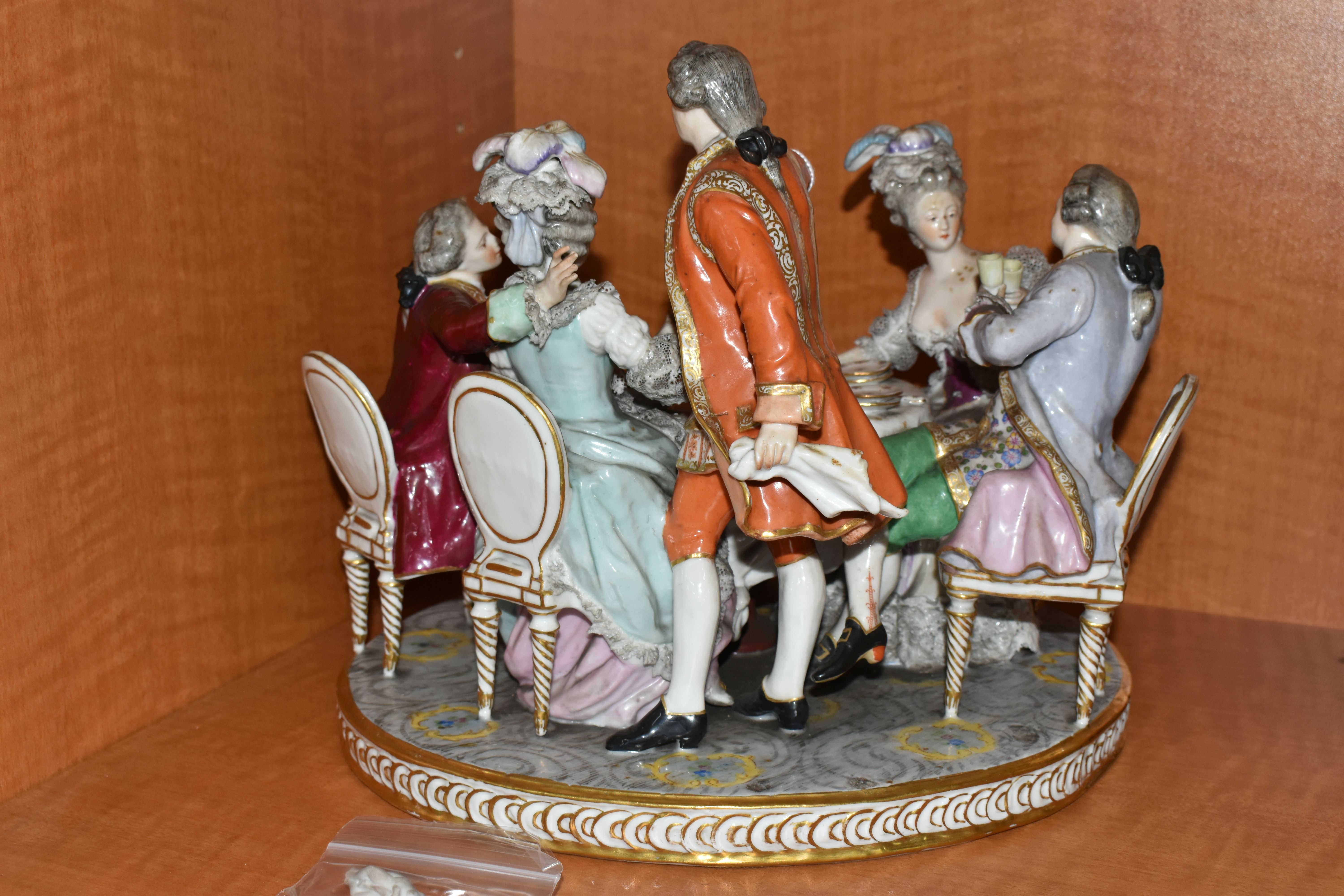 A 19TH CENTURY PARIS PORCELAIN FIGURE GROUP OF FIVE 18TH CENTURY FIGURES AROUND A DINING TABLE, with - Image 5 of 9