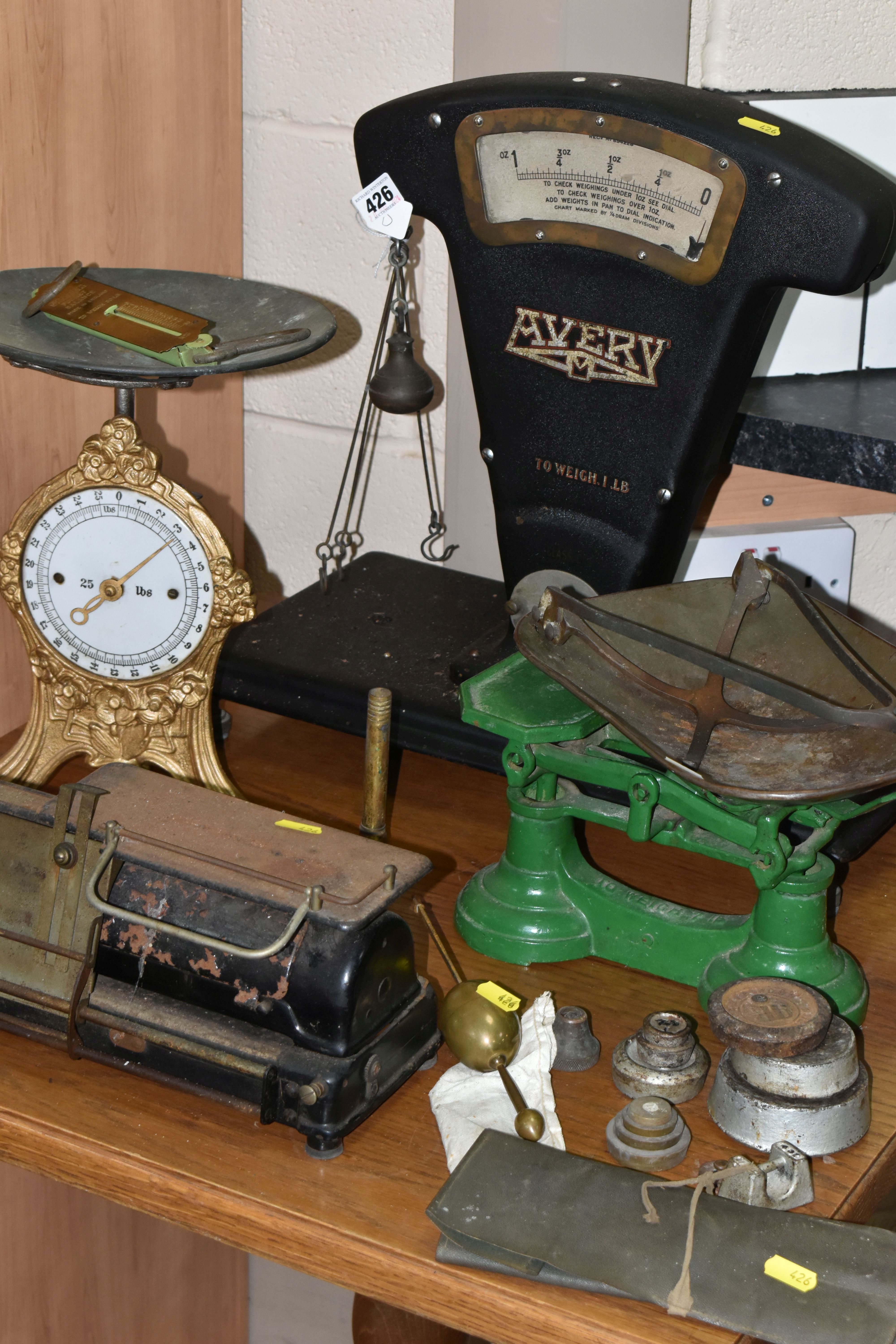 A COLLECTION OF SCALES, MEASURING EQUIPMENT, WEIGHTS, ETC, to include a large Avery Tobacco Scale,