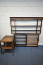 A GEORGIAN OAK HANGING PLATE RACK, width 187cm x height 107cm, along with two open bookcases, and