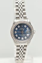 A LADIES BOXED 'ROLEX OYSTER PERPETUAL DATEJUST' WRISTWATCH, manual wind, round blue dial signed '