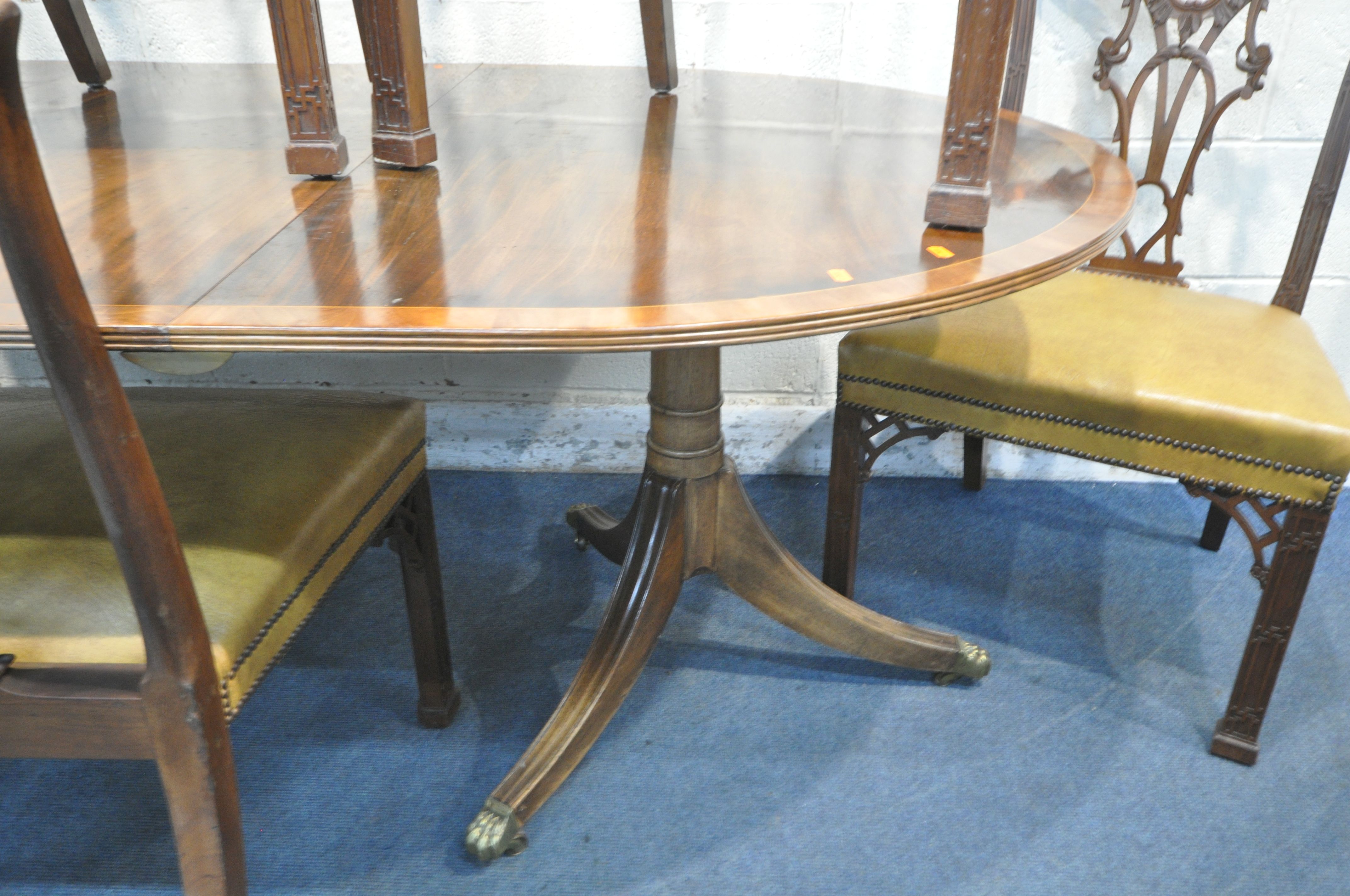 AN GEORGIAN STYLE MAHOGANY AND CROSSBANDED TWIN PEDESTAL DINING TABLE, with a single additional - Image 6 of 7
