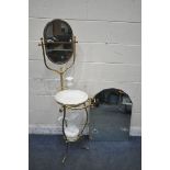 AN EARLY TO MID 20TH CENTURY BRASS FRAMED WASHSTAND, with an oval swinging mirror, ceramic jug, bowl