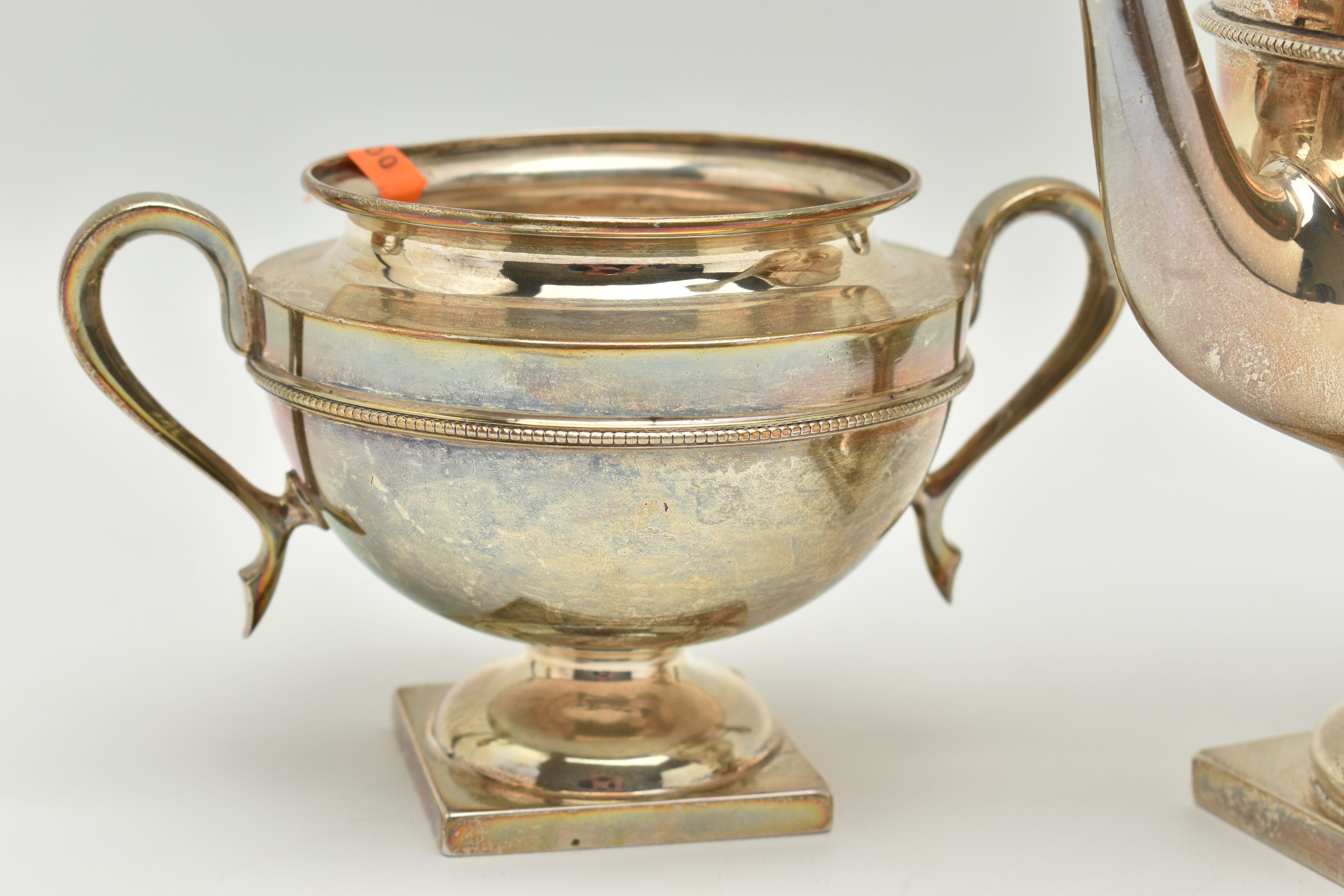 AN EARLY 20TH CENTURY SILVER THREE PIECE TEA SET, comprising of a teapot, sugar bowl and milk jug, - Image 3 of 6