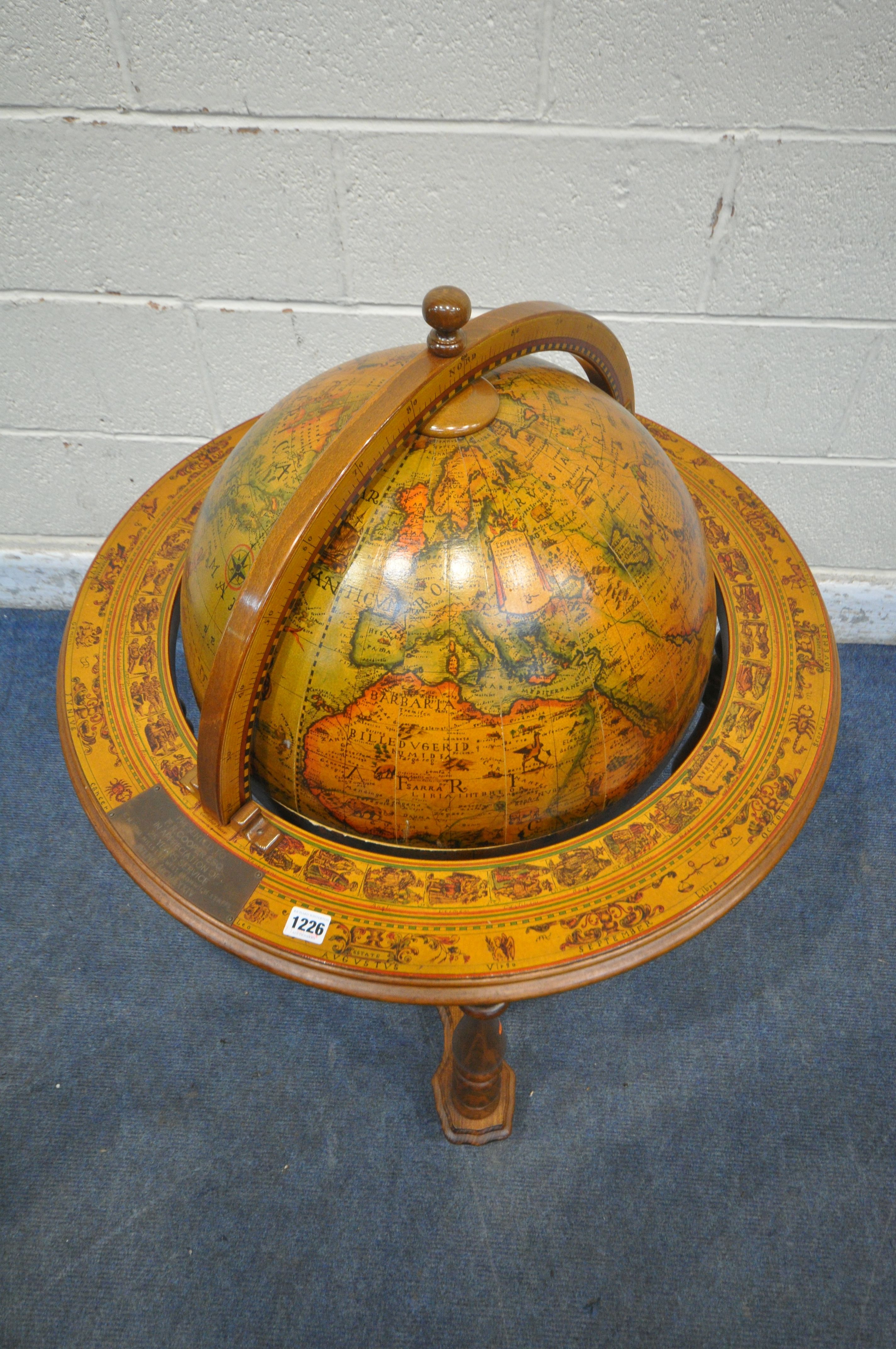 A 20TH CENTURY DRINKS GLOBE, the hinged top enclosing a fitted interior, on turned legs united by - Image 2 of 5