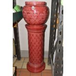 A LARGE RED BURMANTOFT JARDINIERE AND A SIMILAR COLOURED STAND, impressed marks to the base of the