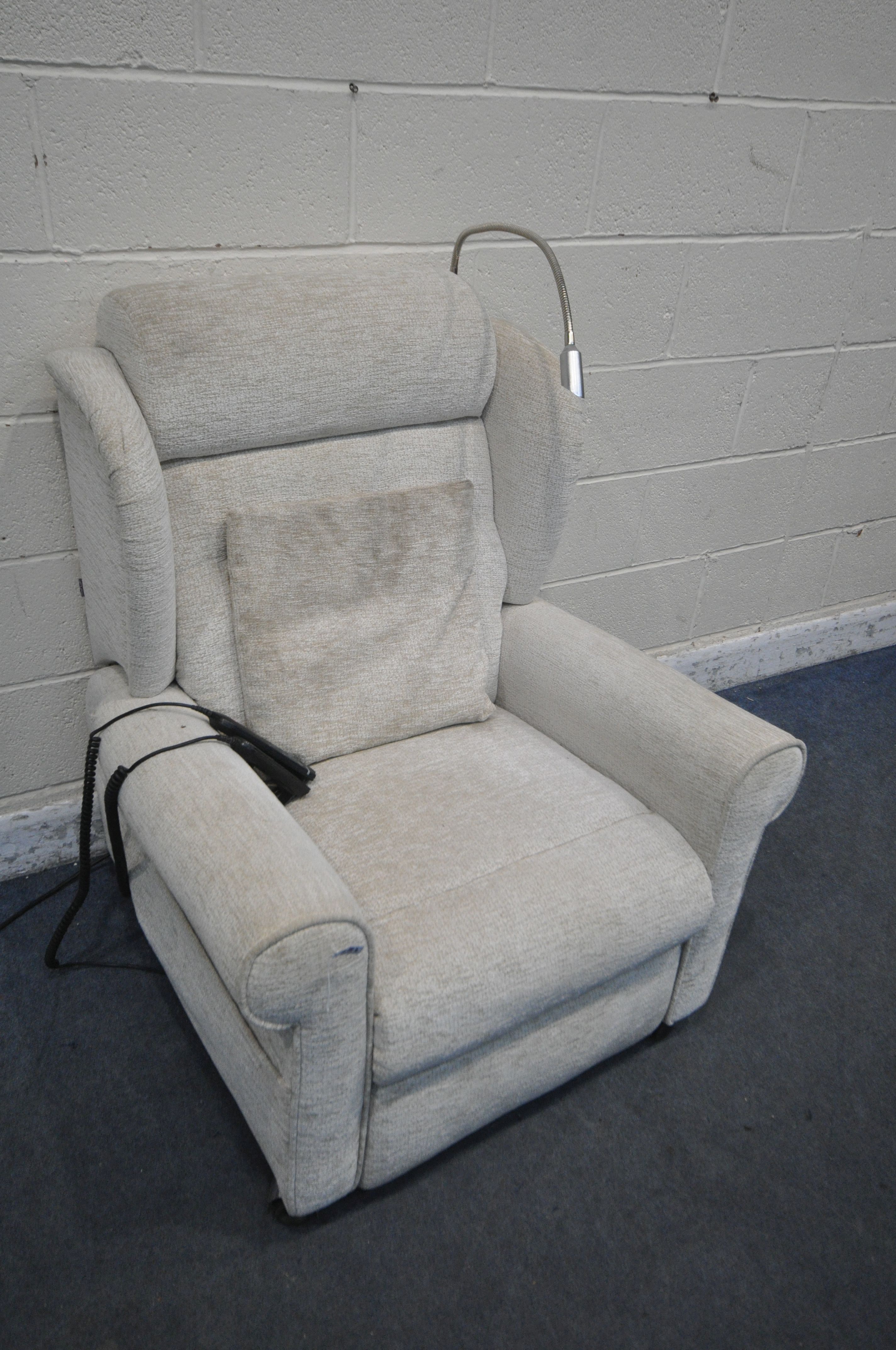A BEIGE UPHOLSTERED ELECTRIC RISE AND RECLINE ARMCHAIR, with massaging settings (PAT pass and - Image 2 of 4