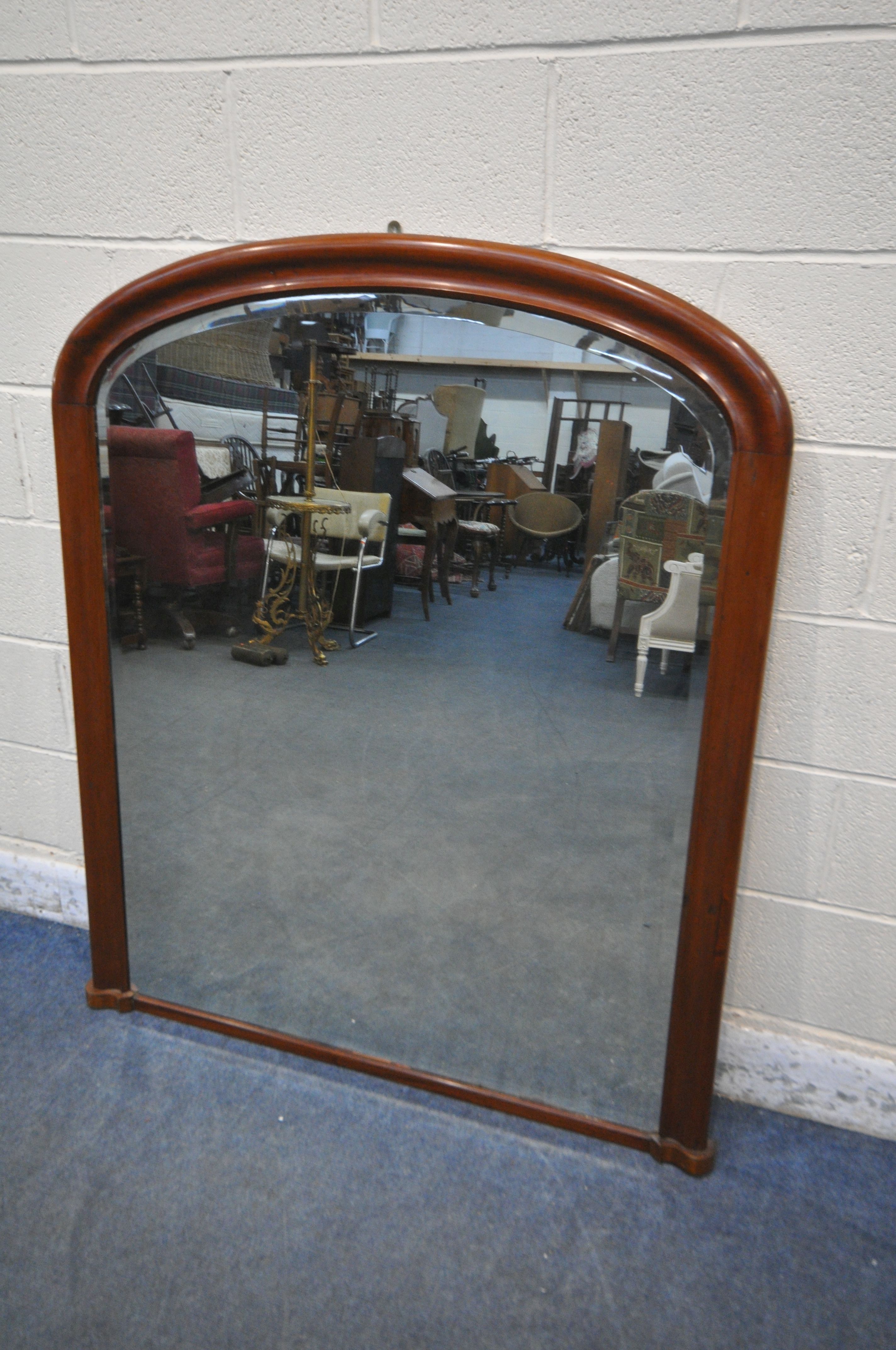 A VICTORIAN MAHOGANY OVERMANTEL MIRROR, with a bevelled plate, 110cm x 132cm (condition report: