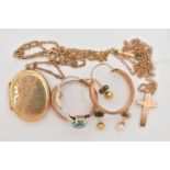 A SMALL BAG OF JEWELLERY, to include a pair of polished yellow metal hoops, unmarked, 1.8 grams, a