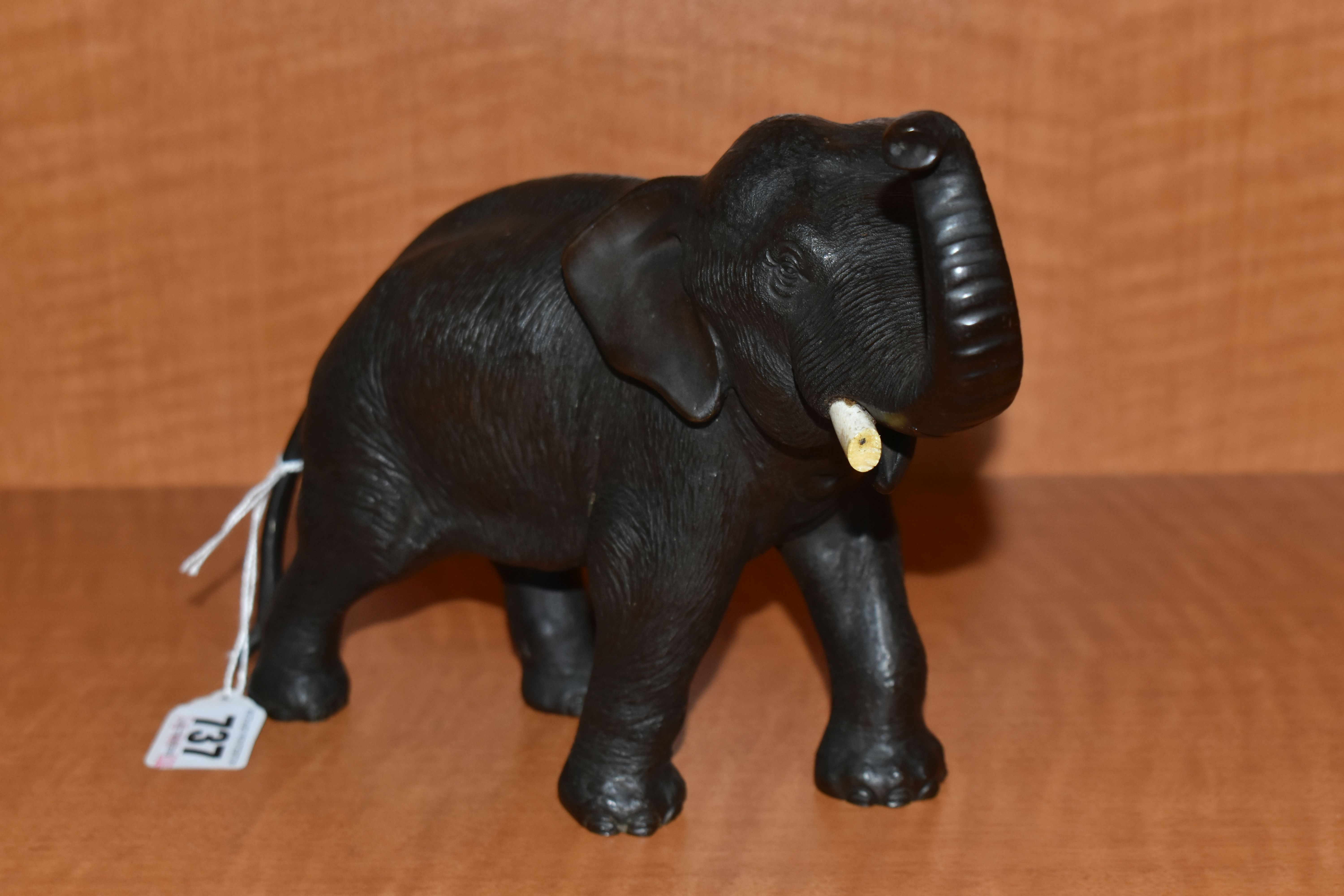 A LATE 19TH CENTURY MEIJI PERIOD JAPANESE BRONZE FIGURE OF AN ELEPHANT WITH TRUNK RAISED, remnants - Image 2 of 5