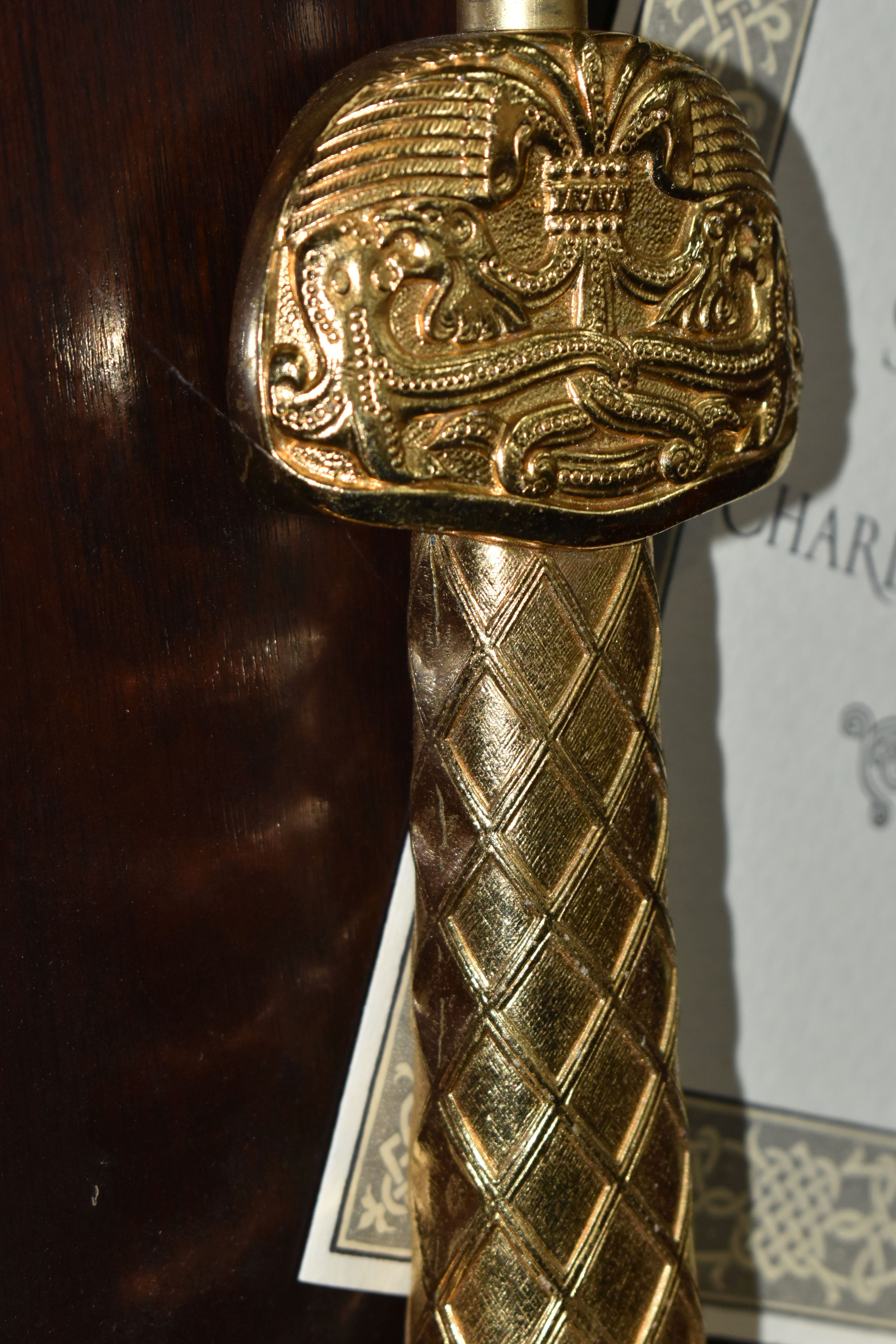 A REPRODUCTION FRANKLIN MINT SWORD OF CHARLEMAGNE WITH WOODEN DISPLAY BOARD AND CERTIFICATE, gold - Image 4 of 6