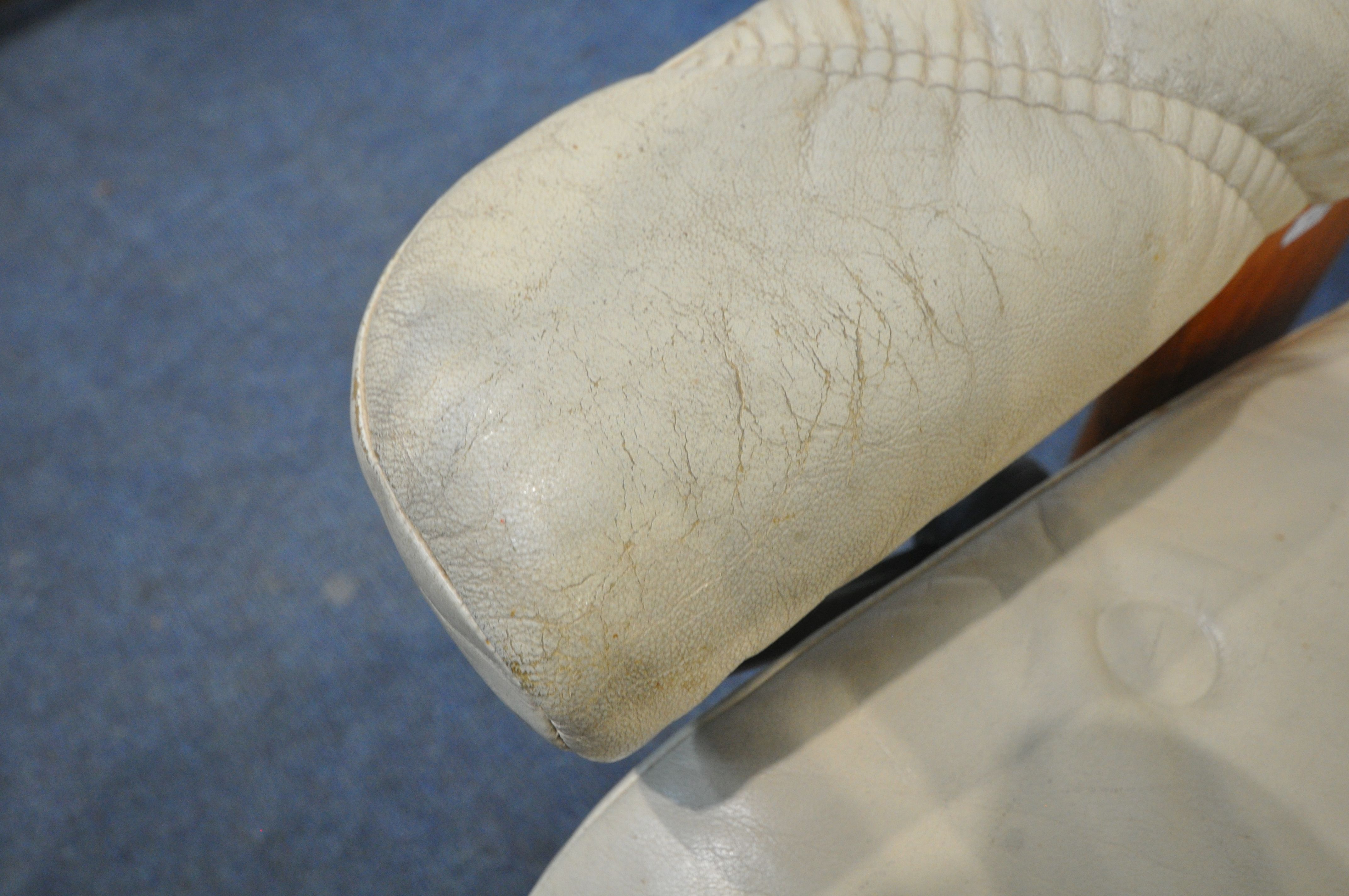 AN EKORNES STRESSLESS CREAM LEATHER SWIVEL RECLINING ARMCHAIR, along with a footstool (condition - Image 3 of 5
