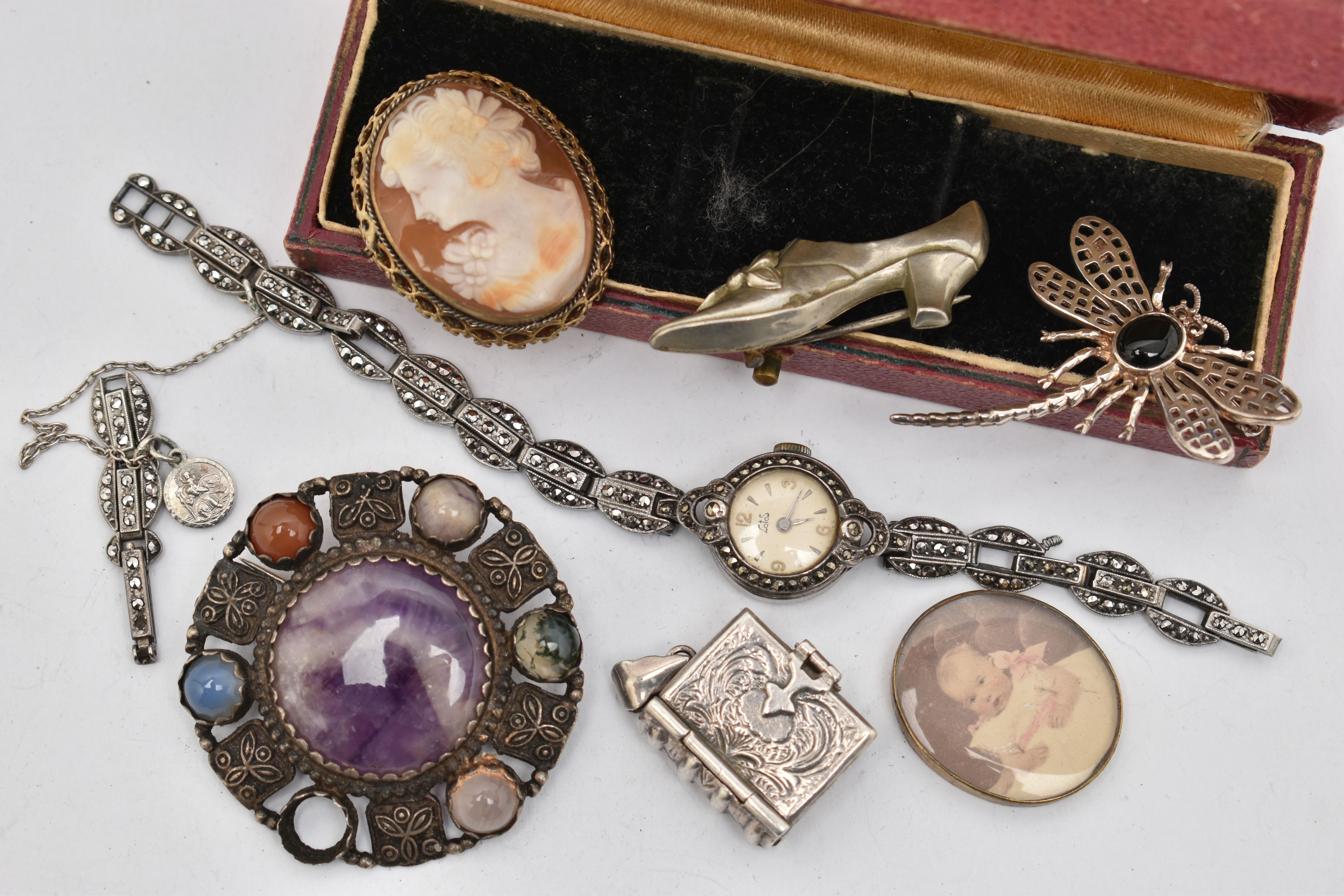 SEVEN ITEMS OF JEWELLERY, to include a ladies white metal and marcasite manual wind wristwatch, dial