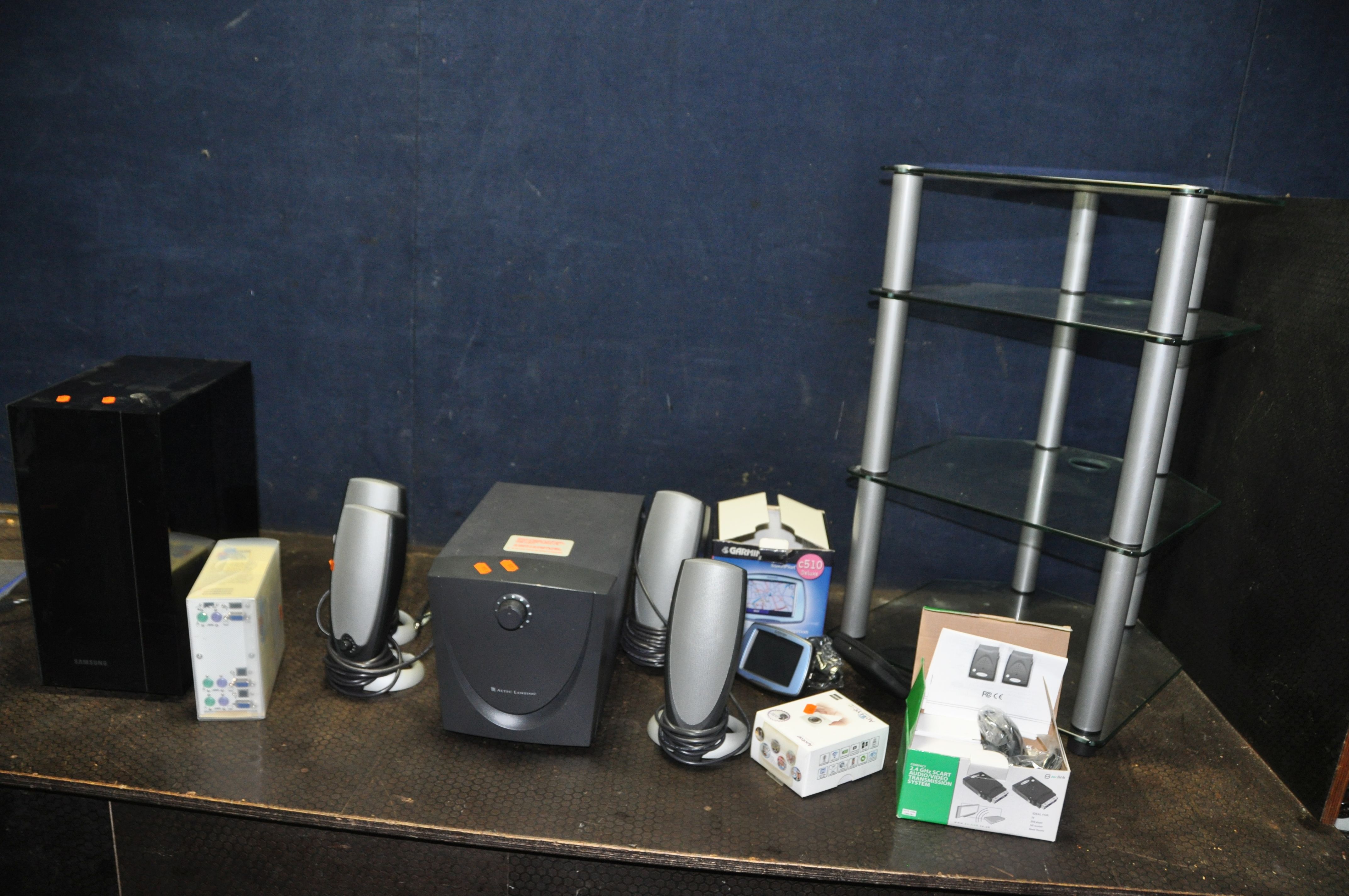 A SELECTION OF AUDIO VISUAL EQUIPMENT including a glass four tier hi fi stand, an Altec Lansing