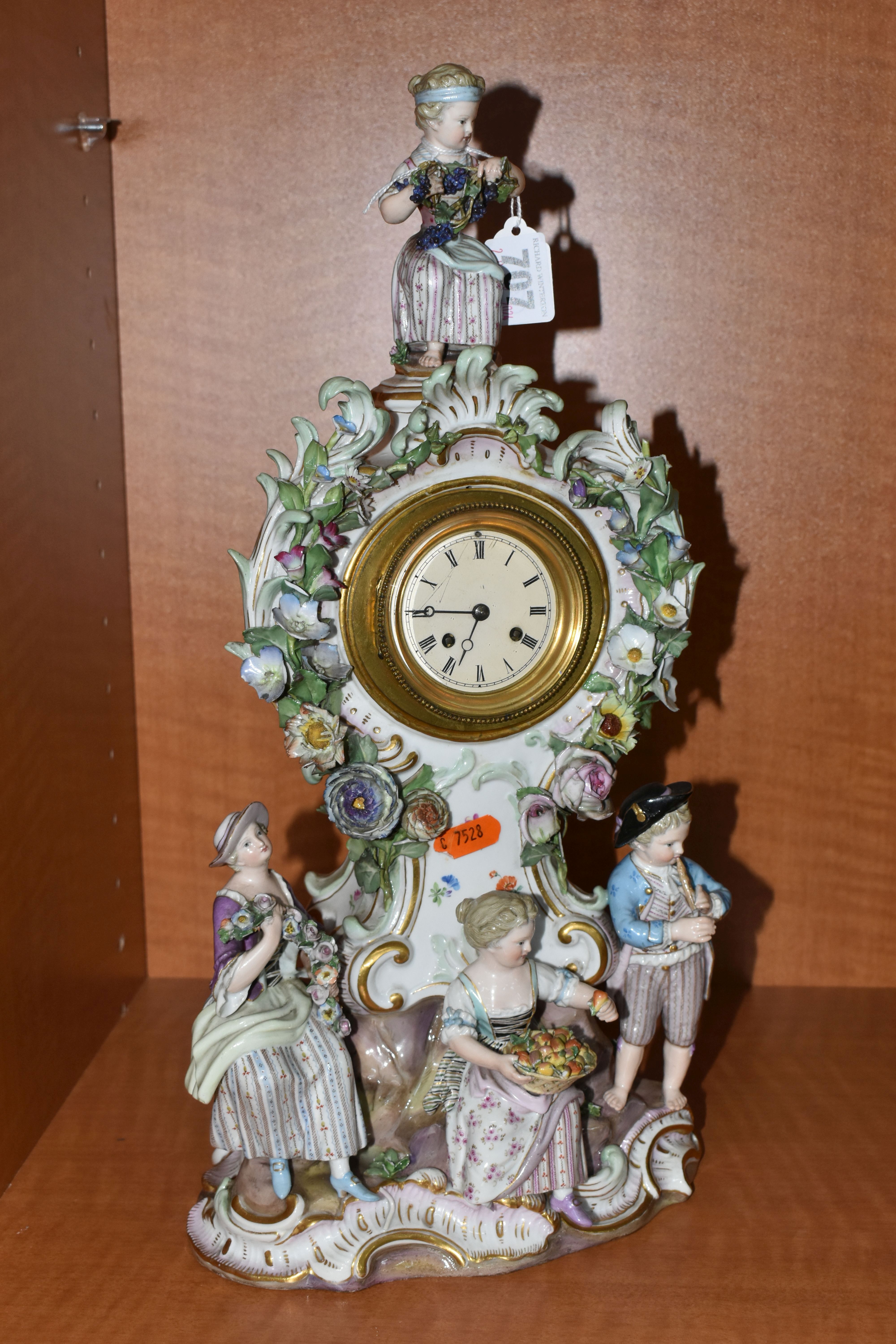 A LATE 19TH CENTURY MEISSEN PORCELAIN FIGURAL MANTEL CLOCK OF BALLOON SHAPE, mould no .572, with