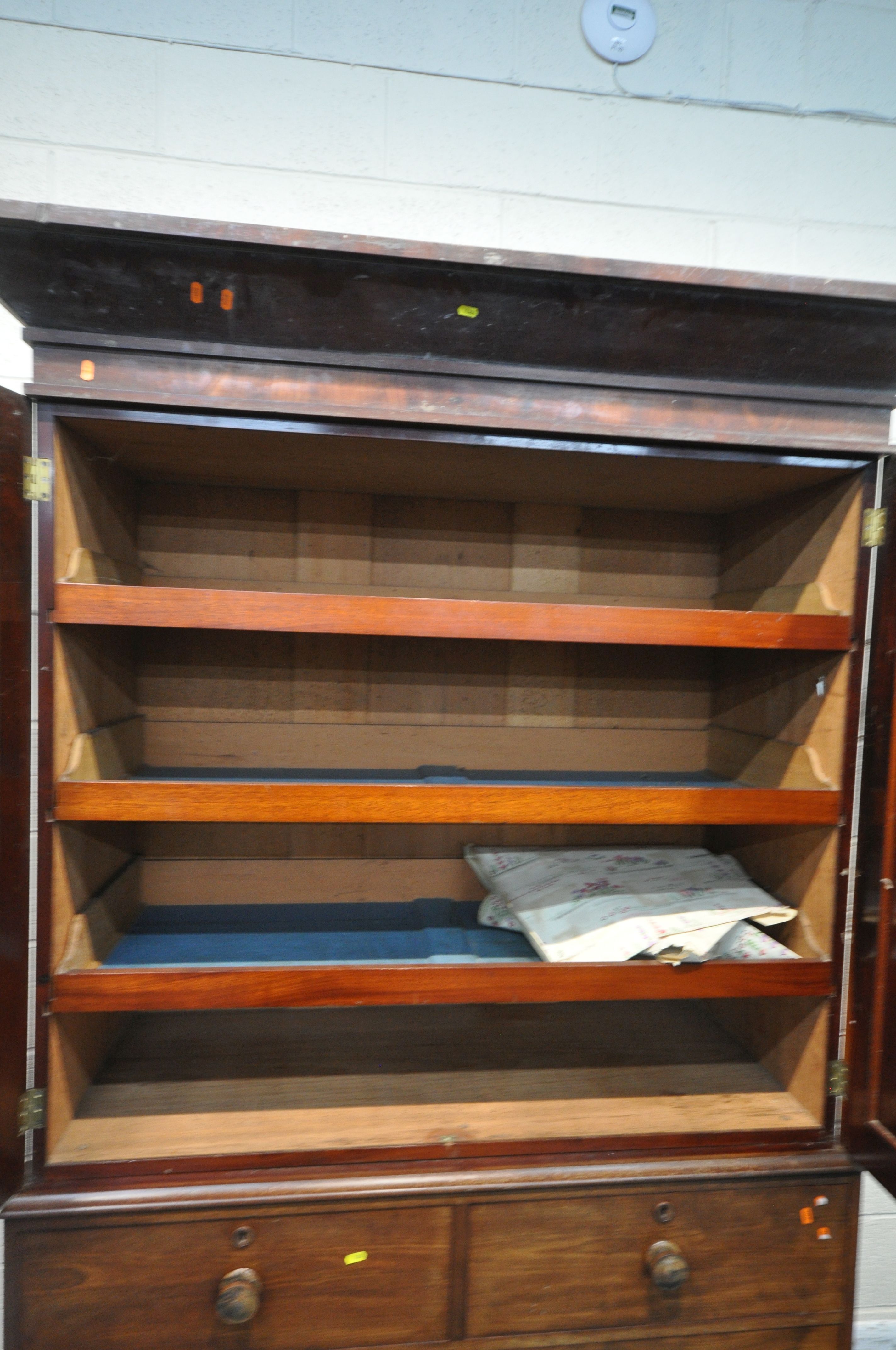 A 19TH CENTURY MAHOGANY LINEN PRESS, with a loose overhanging cornice, the double doors enclosing - Image 3 of 6