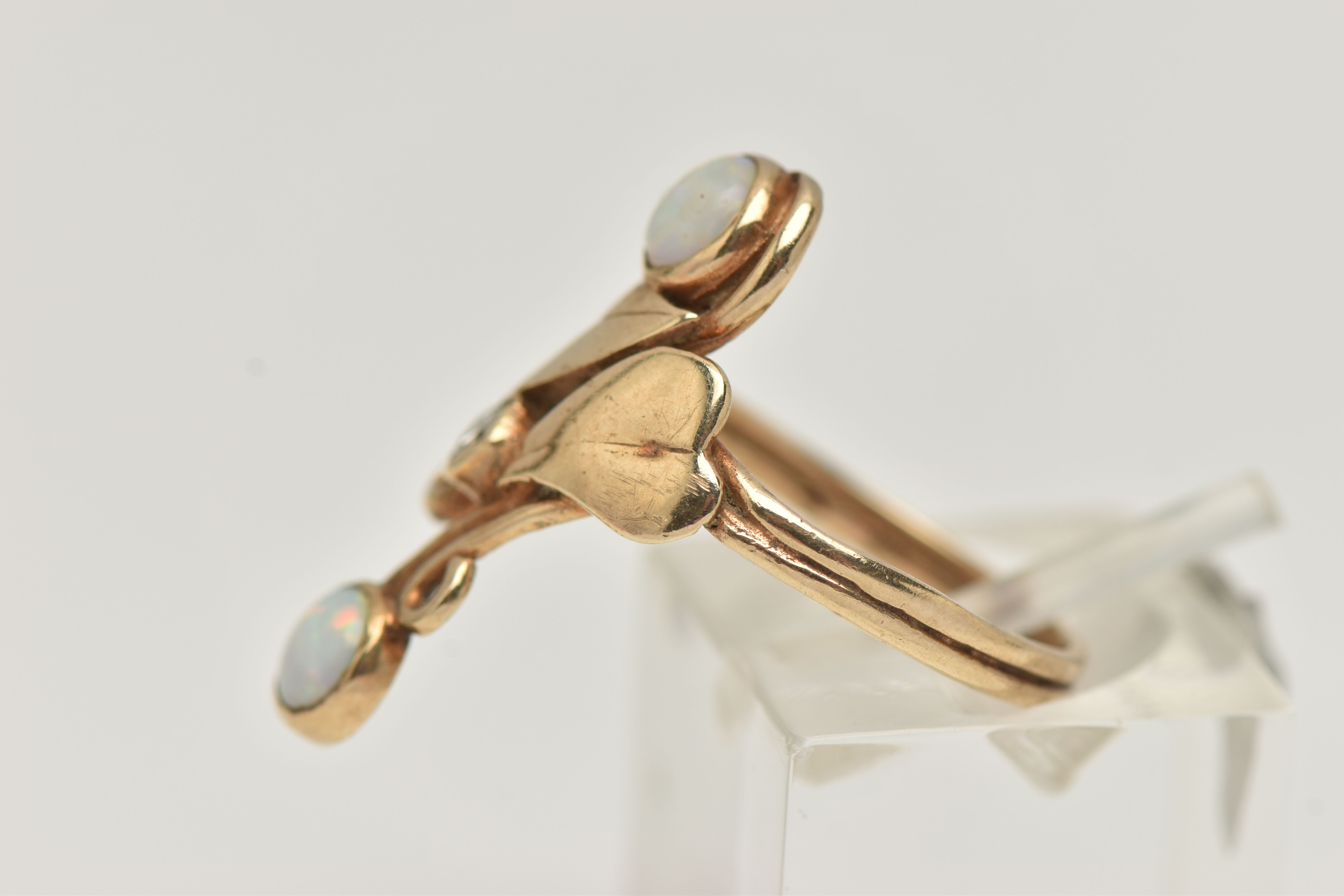 A 9CT GOLD OPAL AND DIAMOND RING, the up finger ring with central single cut diamond and foliate - Image 2 of 4