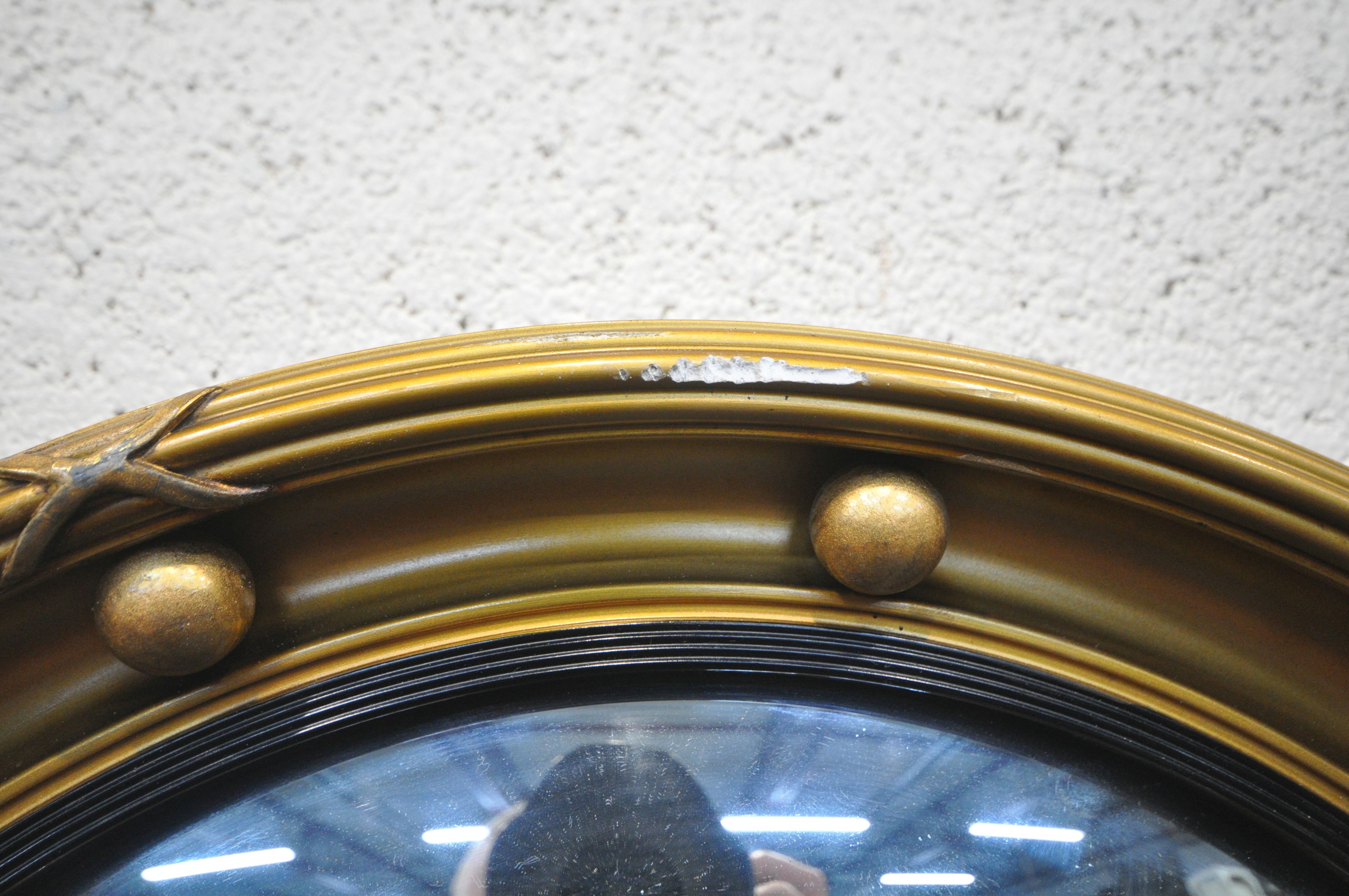 A GILT RESIN OVAL BEVELLED EDGE WALL MIRROR, with foliate details, 90cm x 69cm, a Regency style - Image 4 of 6