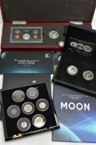 A CARDBOARD BOX CONTAINING BRADFORD EXCHANGE COINS, items to include a definitive US Mint Moon