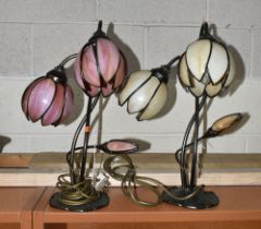 TWO MODERN TABLE LAMPS WITH COLOURED GLASS SHADES IN THE FORM OF FLOWER HEADS, one white the other