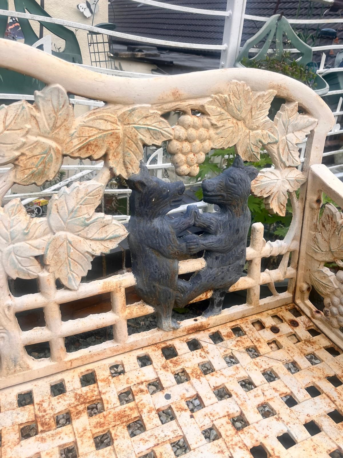 A CAST IRON BLACK FOREST STYLE GARDEN BENCH, the seat is supported by two angry black bears, the - Image 6 of 9