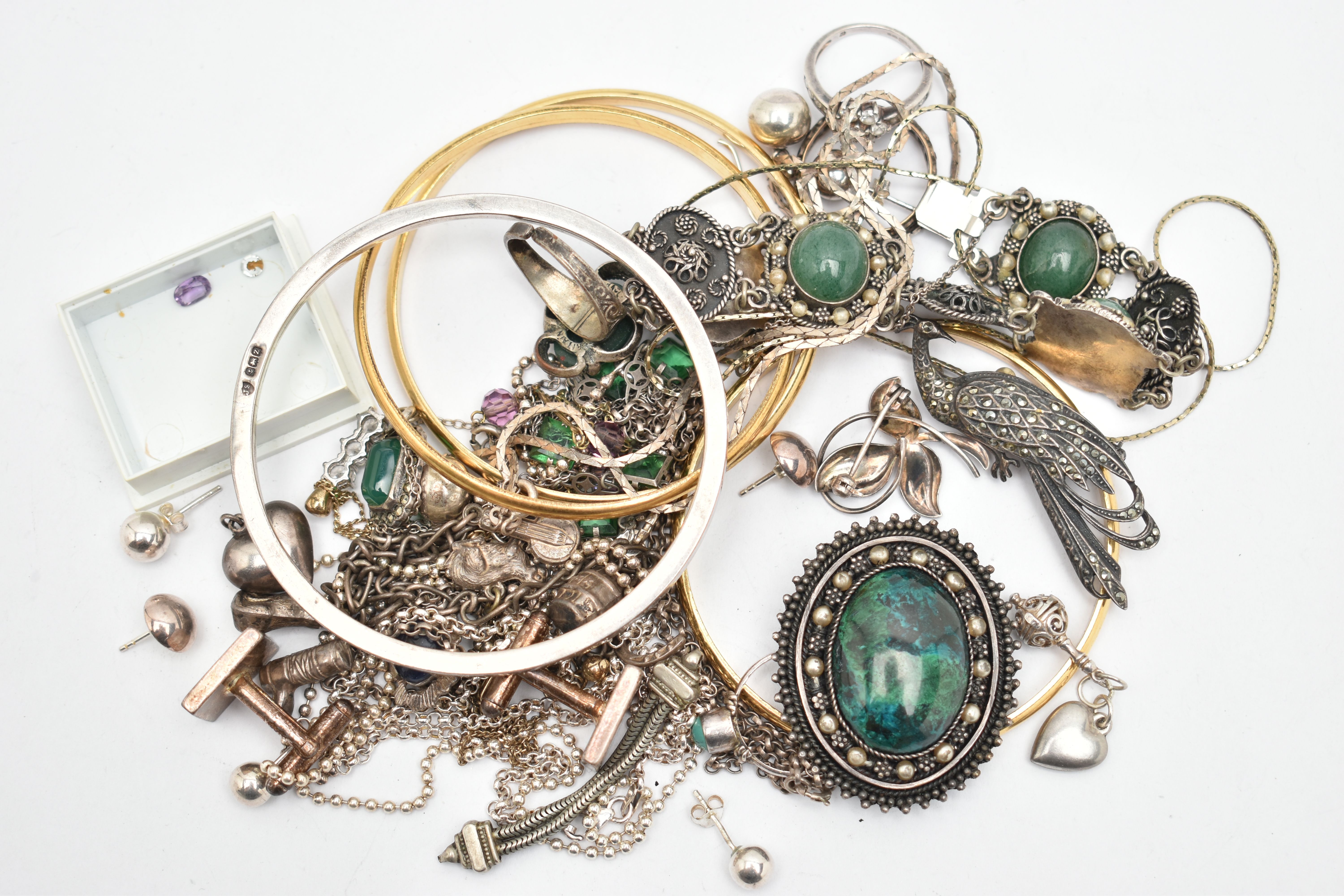 A SMALL BAG OF ASSORTED JEWELLERY, to include three rolled gold bangles, a silver bangle, hallmarked