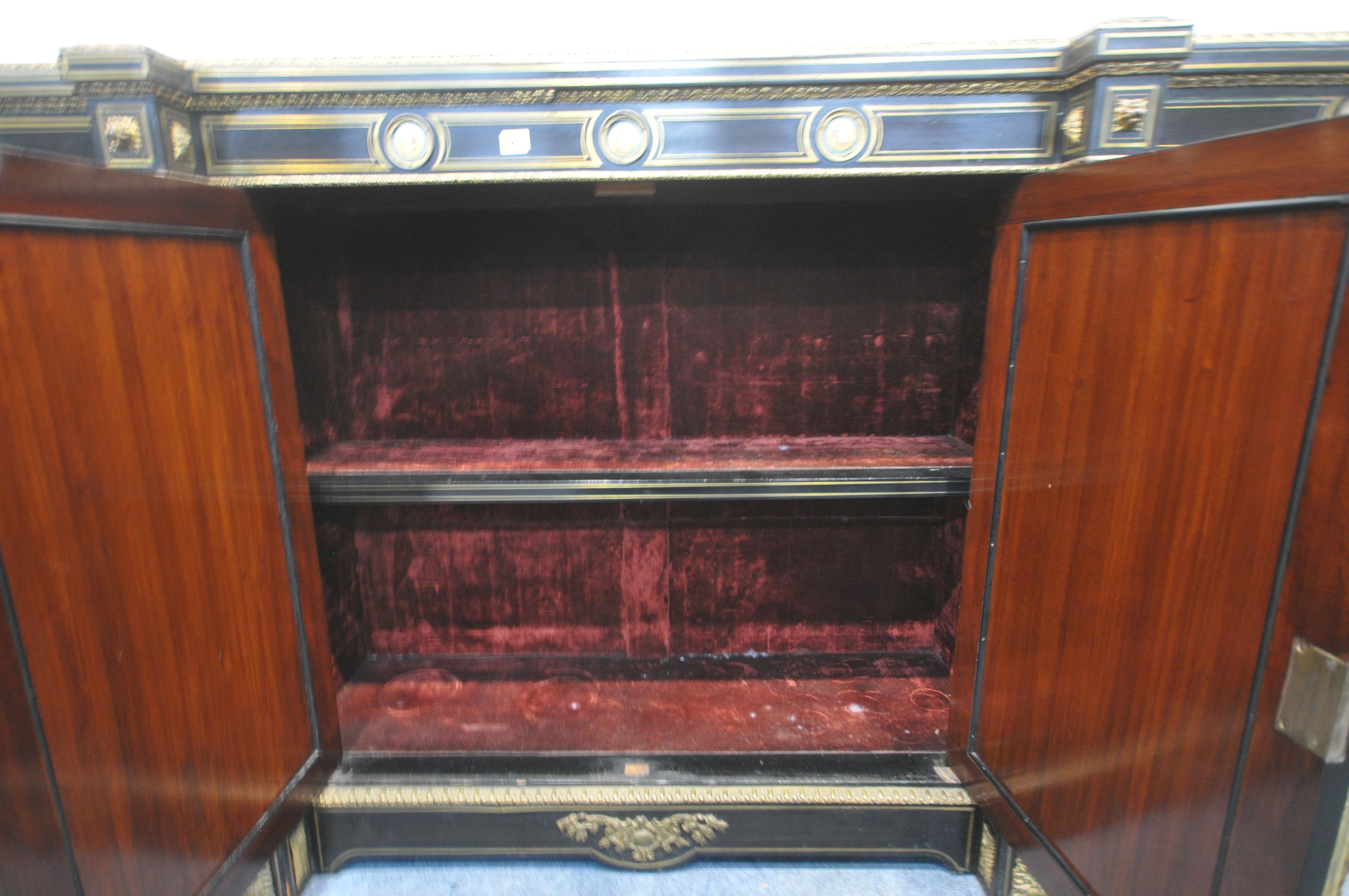 A 19TH CENTURY EBONISED AND GILT BRASS CREDENZA, with four moulded tops supporting Corinthian - Image 6 of 7