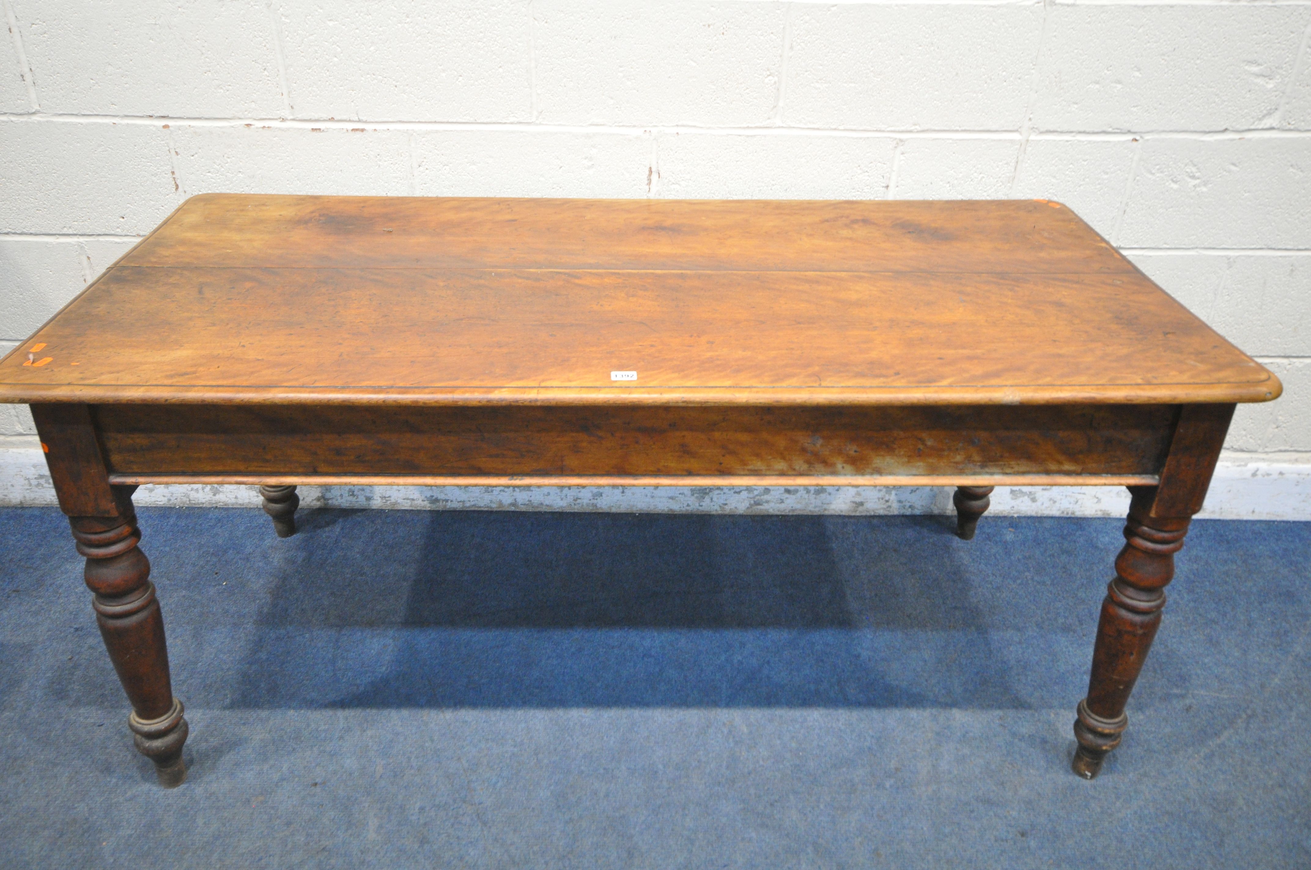 A VICTORIAN BIRCH RECTANGULAR TABLE, on turned legs, length 162cm x depth 79cm x height 73cm (