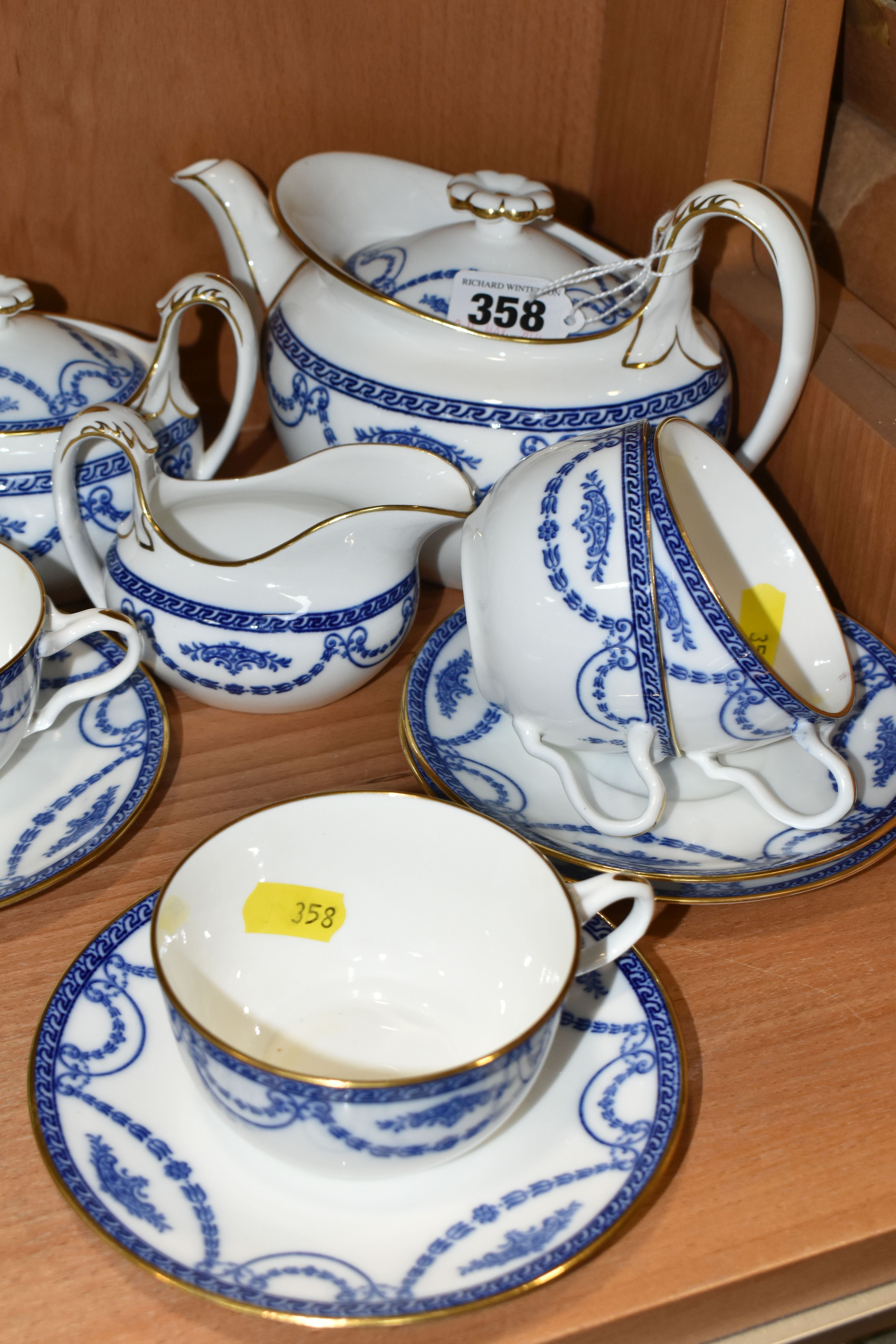 A GROUP OF WEDGWOOD TEAWARE, a Wedgwood tea set decorated with blue floral swags, gilt edged on a - Image 2 of 7