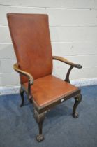 A GEORGIAN MAHOGANY ARMCHAIR, reupholstered with brown leatherette, the open armrests with an