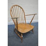 A MID CENTURY ERCOL WINDSOR ARMCHAIR, with a spindle hoop back (condition report: water stained