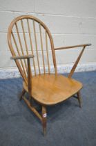 A MID CENTURY ERCOL WINDSOR ARMCHAIR, with a spindle hoop back (condition report: water stained