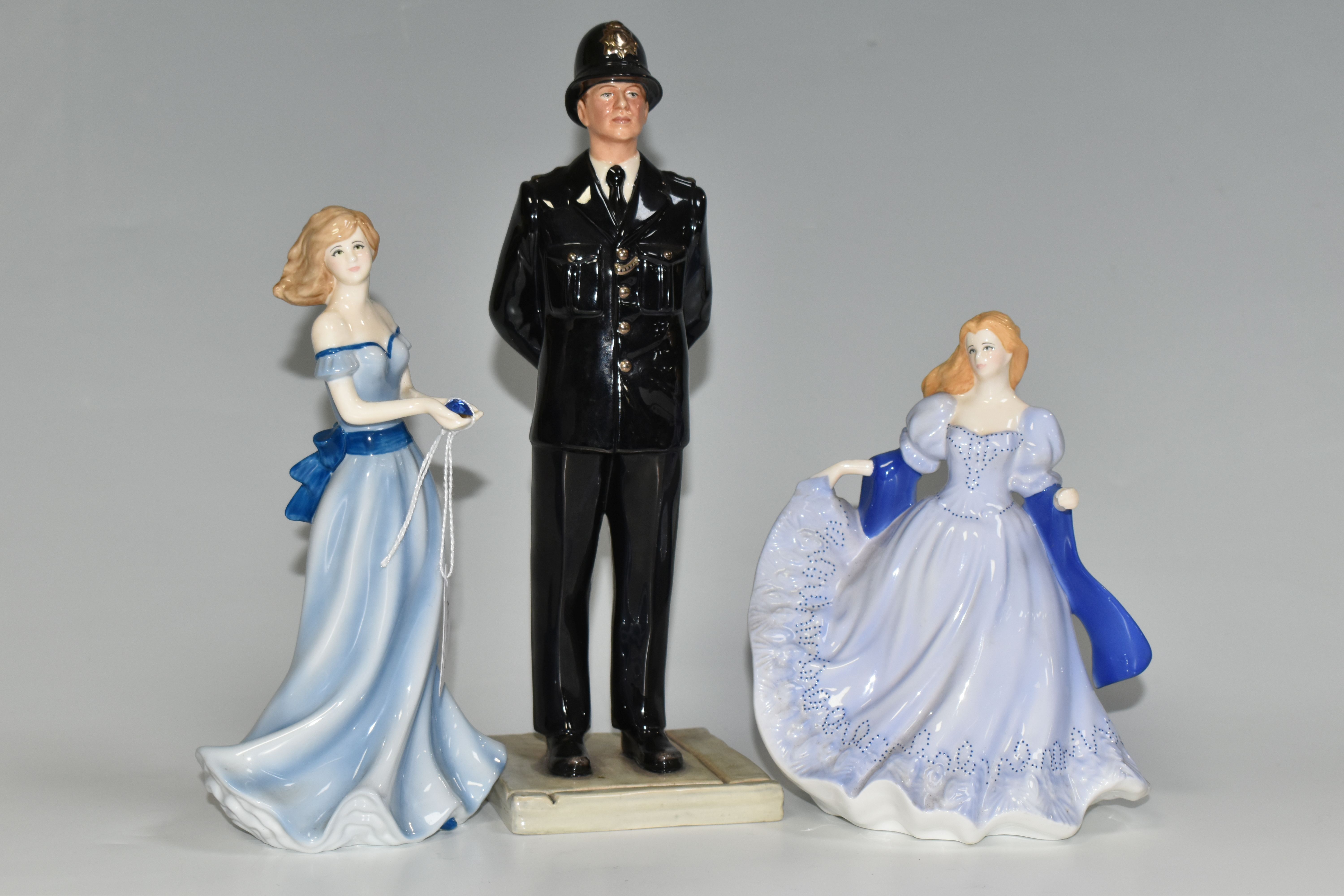 TWO ROYAL WORCESTER FIGURINES AND A ROYAL DOULTON 'BRITISH POLICEMAN' FIGURE, comprising a Royal