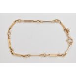 A 9CT GOLD FANCY LINK BRACELET, designed as a row of polished bars interspaced with jump rings,