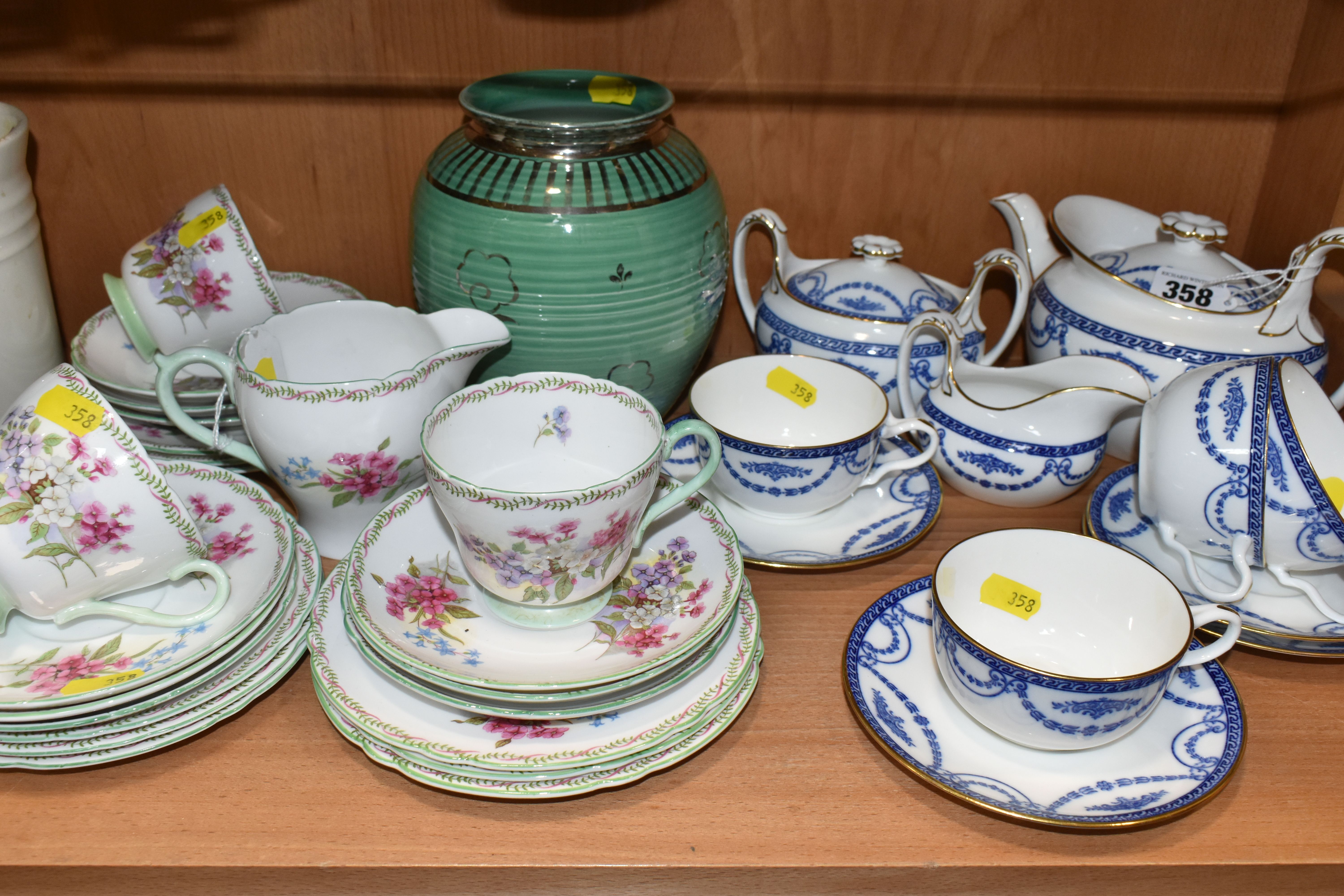 A GROUP OF WEDGWOOD TEAWARE, a Wedgwood tea set decorated with blue floral swags, gilt edged on a