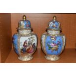 A PAIR OF LATE 19TH CENTURY AUGUSTUS REX PORCELAIN JARS AND COVERS OF BALUSTER FORM, painted with