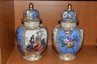 A PAIR OF LATE 19TH CENTURY AUGUSTUS REX PORCELAIN JARS AND COVERS OF BALUSTER FORM, painted with
