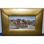 A LATE 19TH CENTURY GILT FRAMED PORCELAIN PLAQUE PAINTED WITH CATTLE WATERING, unsigned and