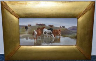 A LATE 19TH CENTURY GILT FRAMED PORCELAIN PLAQUE PAINTED WITH CATTLE WATERING, unsigned and