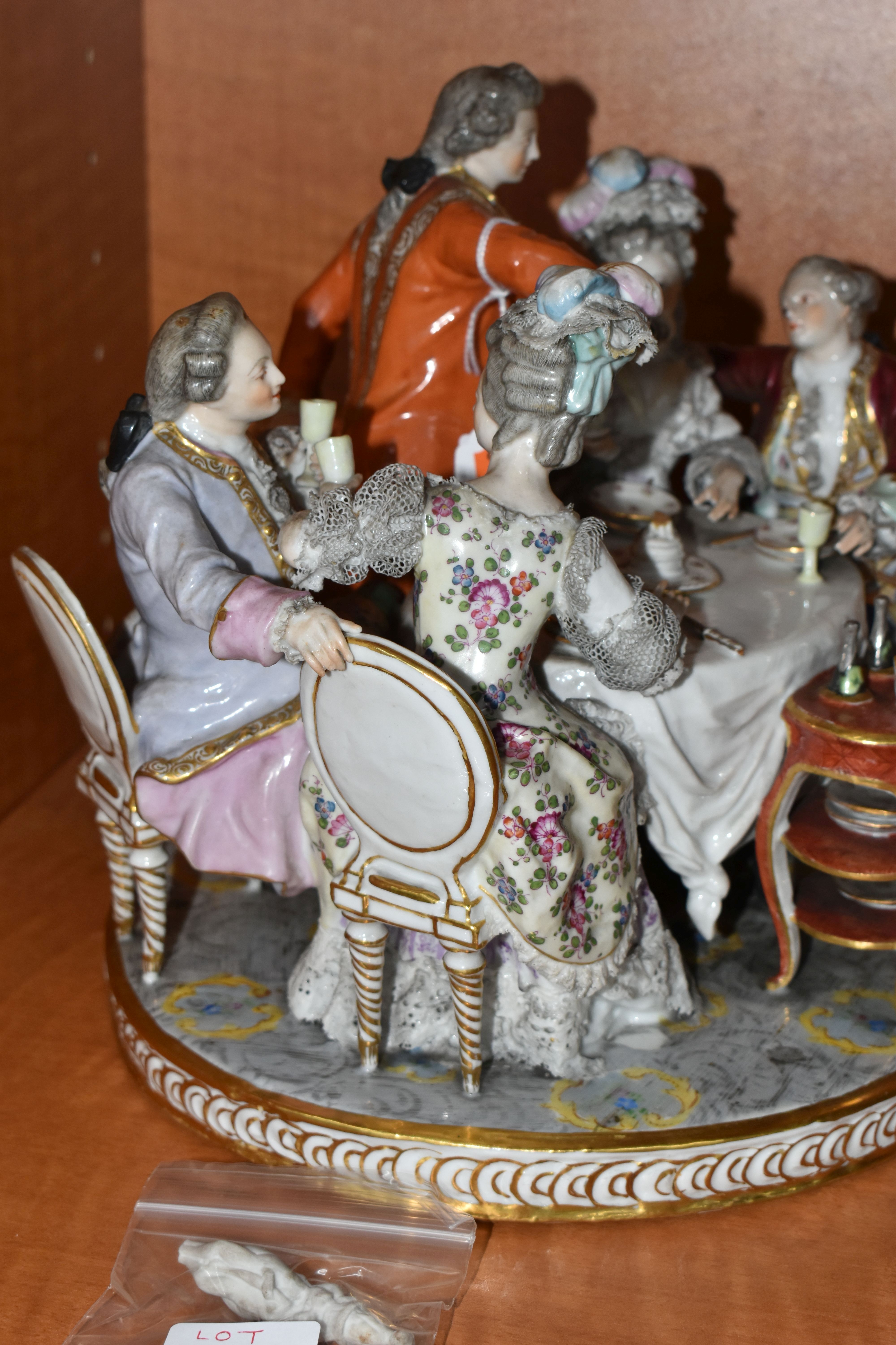 A 19TH CENTURY PARIS PORCELAIN FIGURE GROUP OF FIVE 18TH CENTURY FIGURES AROUND A DINING TABLE, with - Image 7 of 9