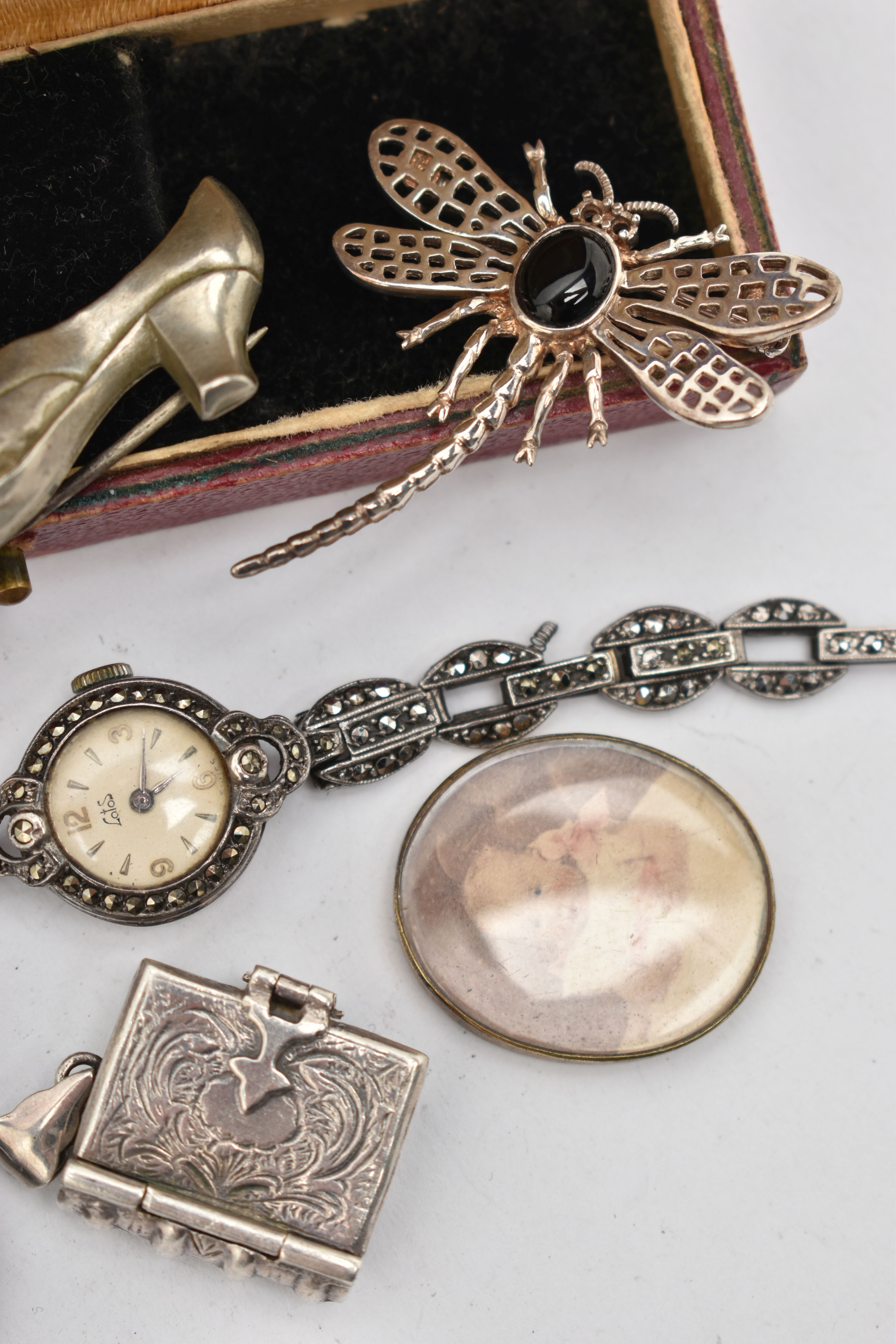 SEVEN ITEMS OF JEWELLERY, to include a ladies white metal and marcasite manual wind wristwatch, dial - Image 4 of 4