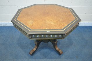 A MID TO LATE 19TH CENTURY EBONISED AND AMBOYNA OCTAGONAL CENTRE TABLE, with brass and porcelain