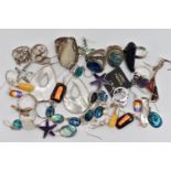 ASSORTED WHITE METAL RINGS AND EARRINGS, to include eight rings of various designs, set with semi-